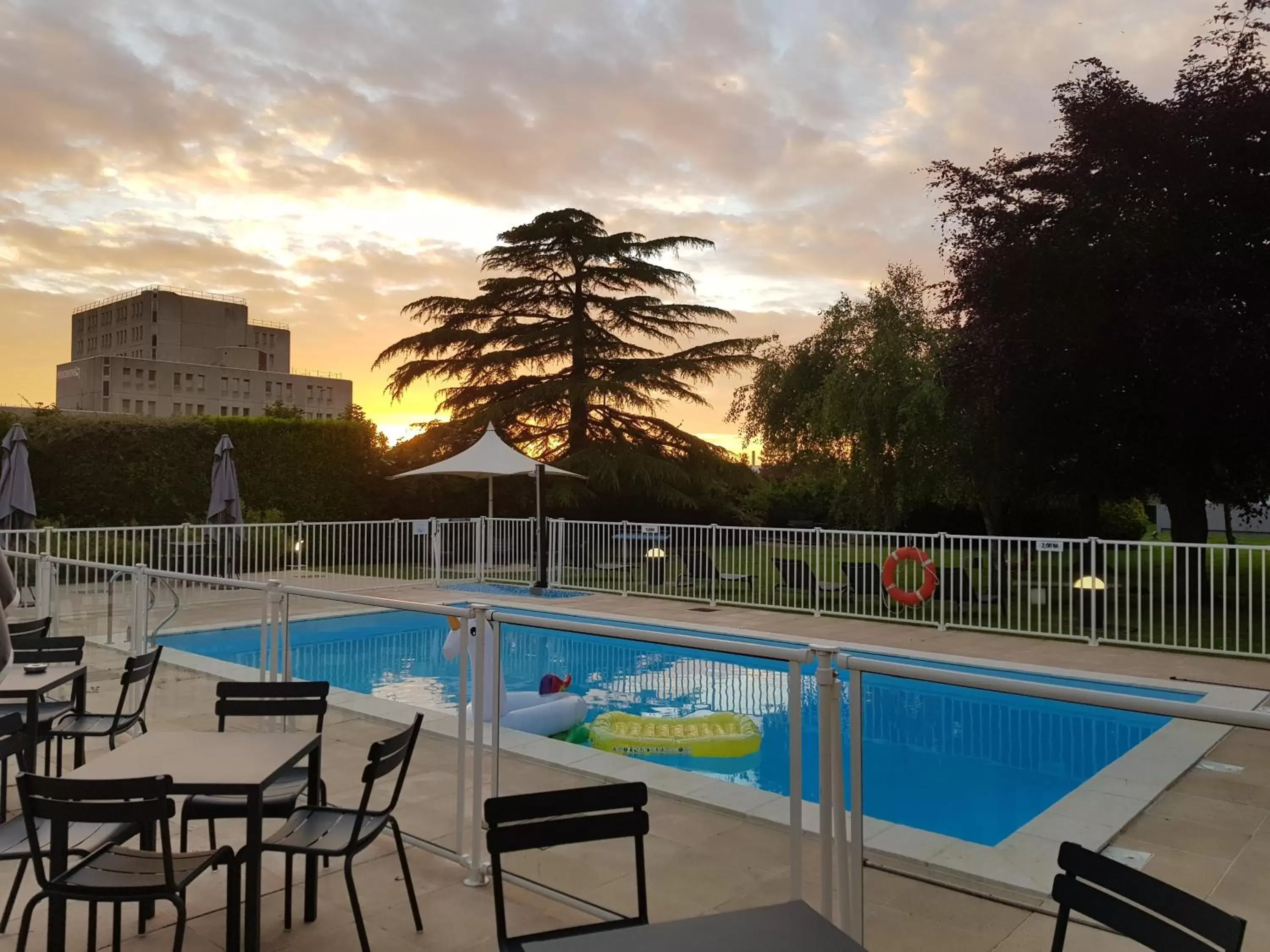 Patio, Swimming Pool in Novotel Caen Côte de Nacre