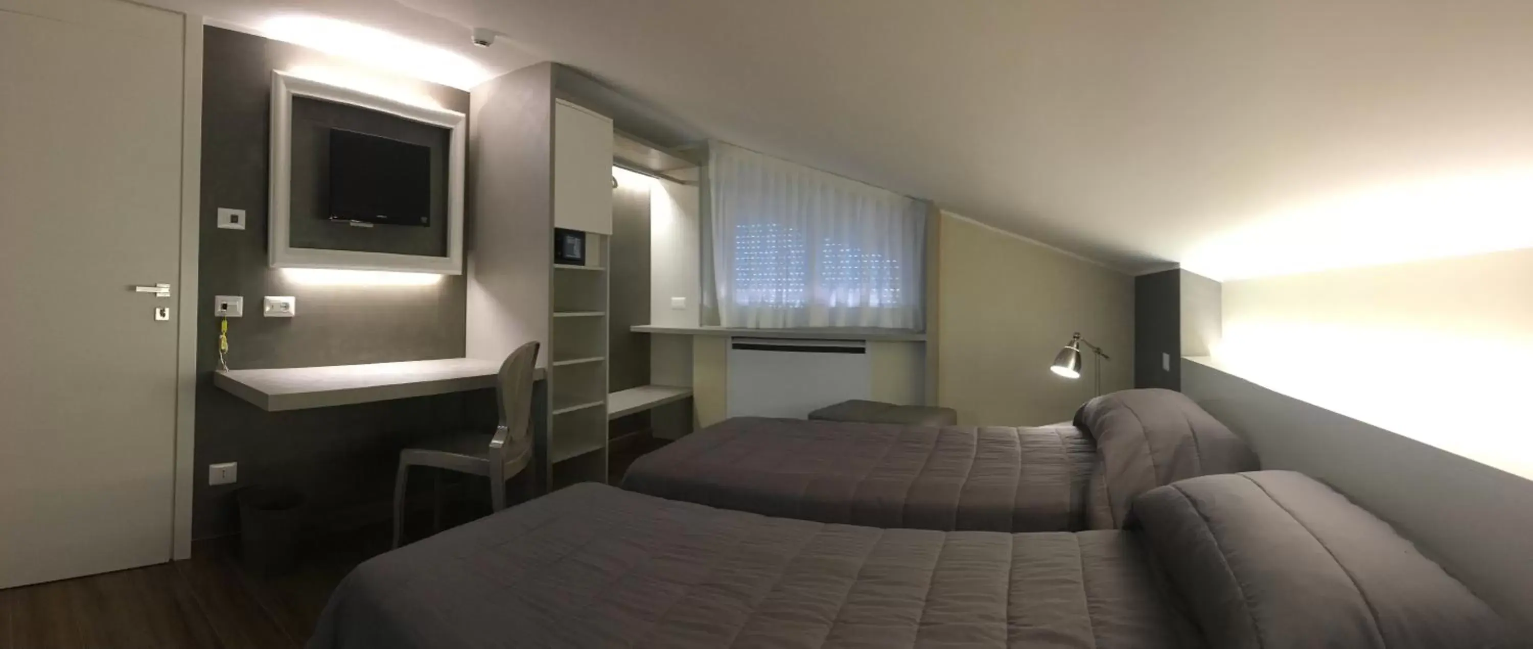 Bed in Hotel Fini Bed in Hotel Fini