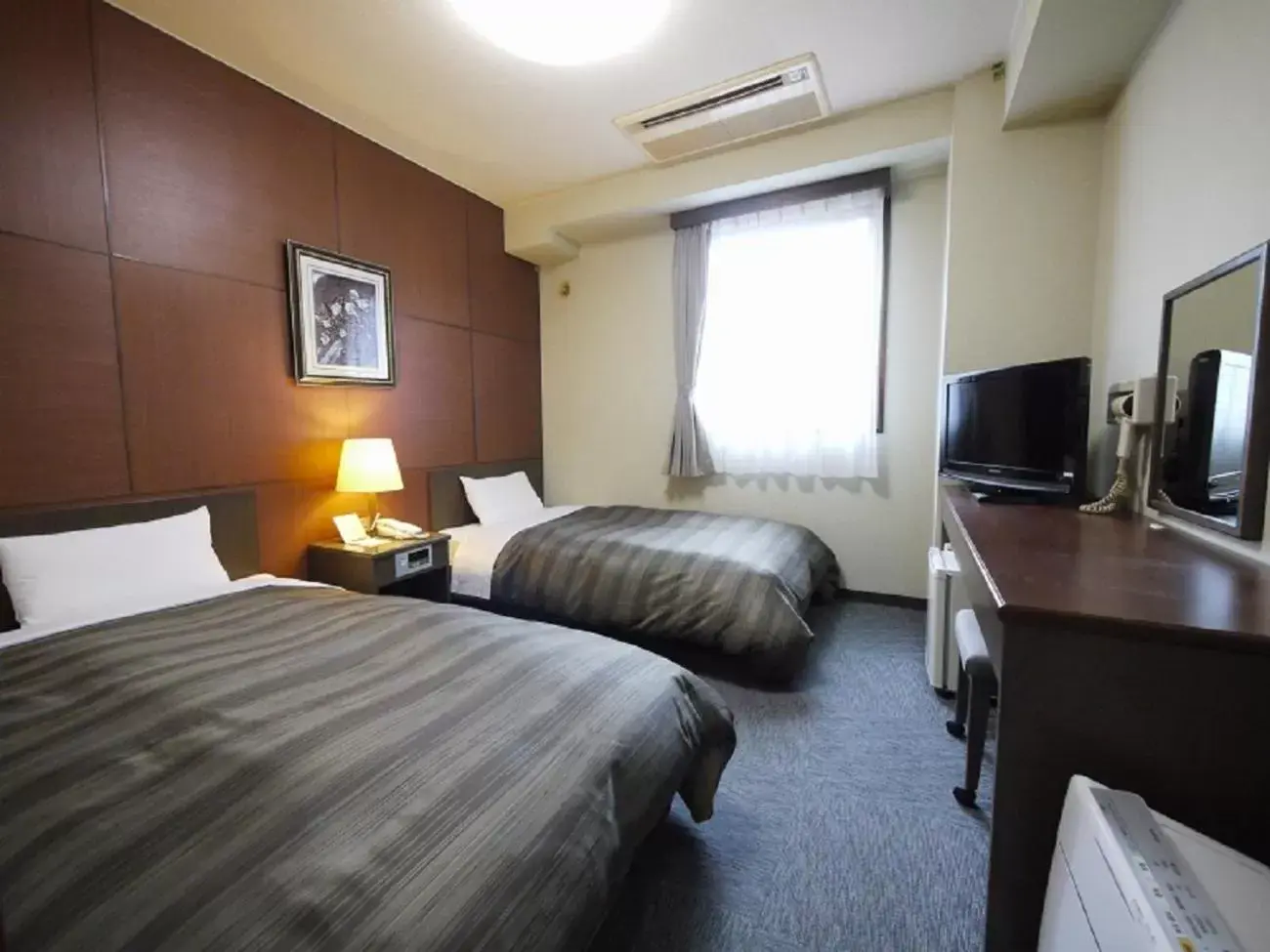 Bed in Hotel Route-Inn Kamisuwa
