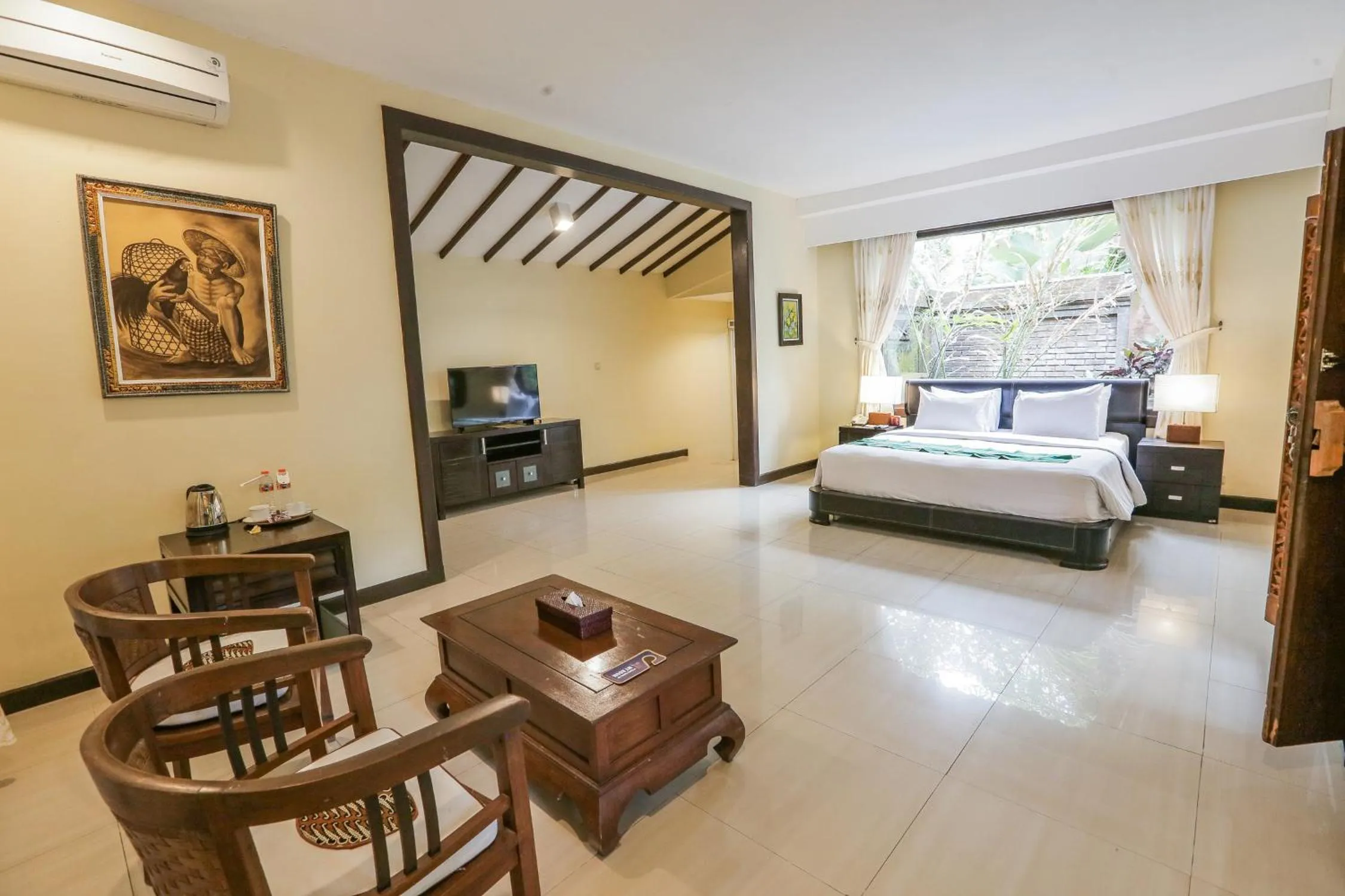 Living room, Bed in Ubud Hotel & Cottages