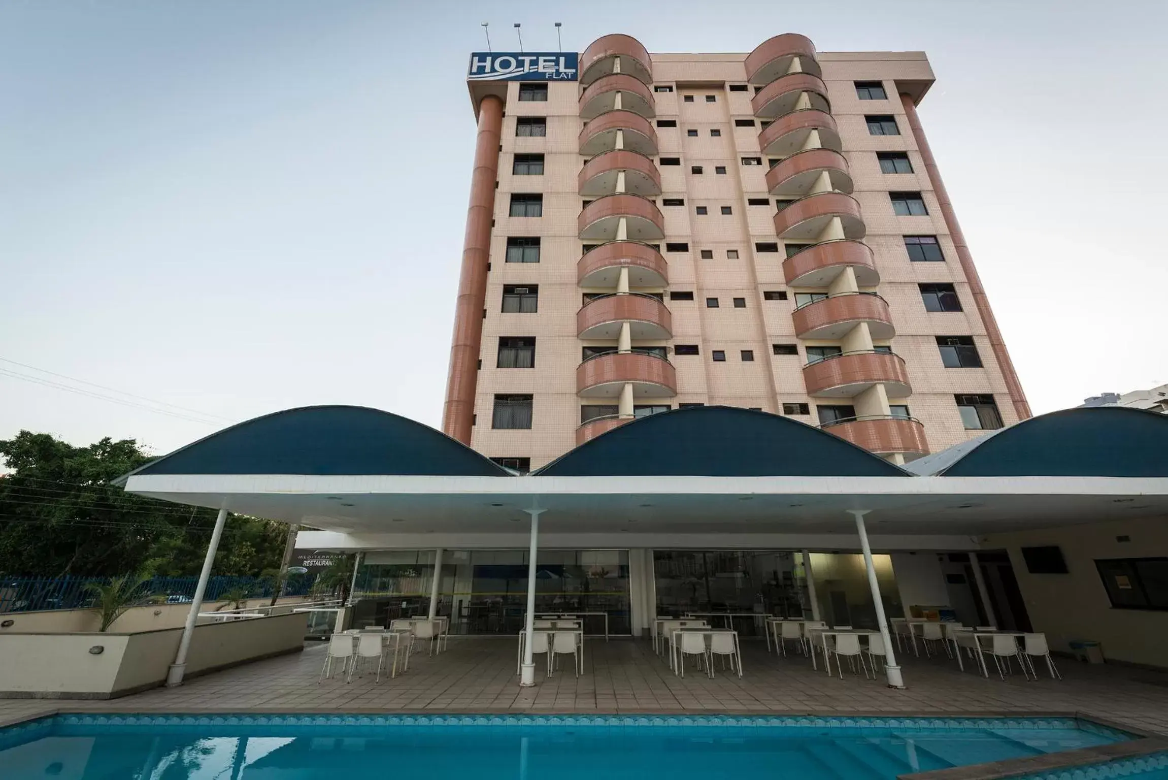Swimming pool, Property Building in Hotel Executive Arrey