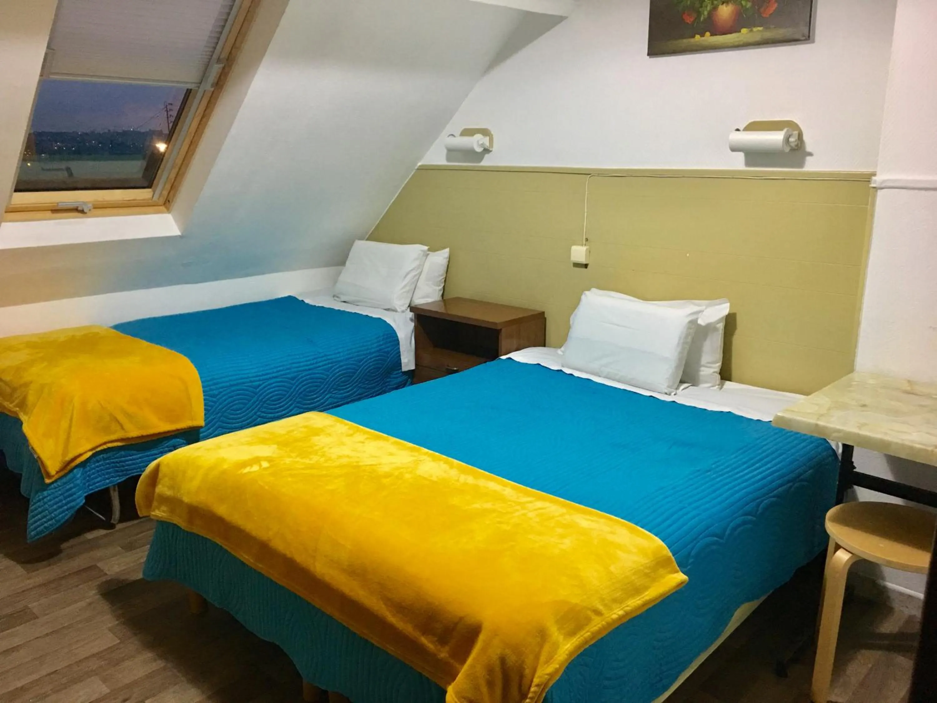 Bed in Hotel Paris Star