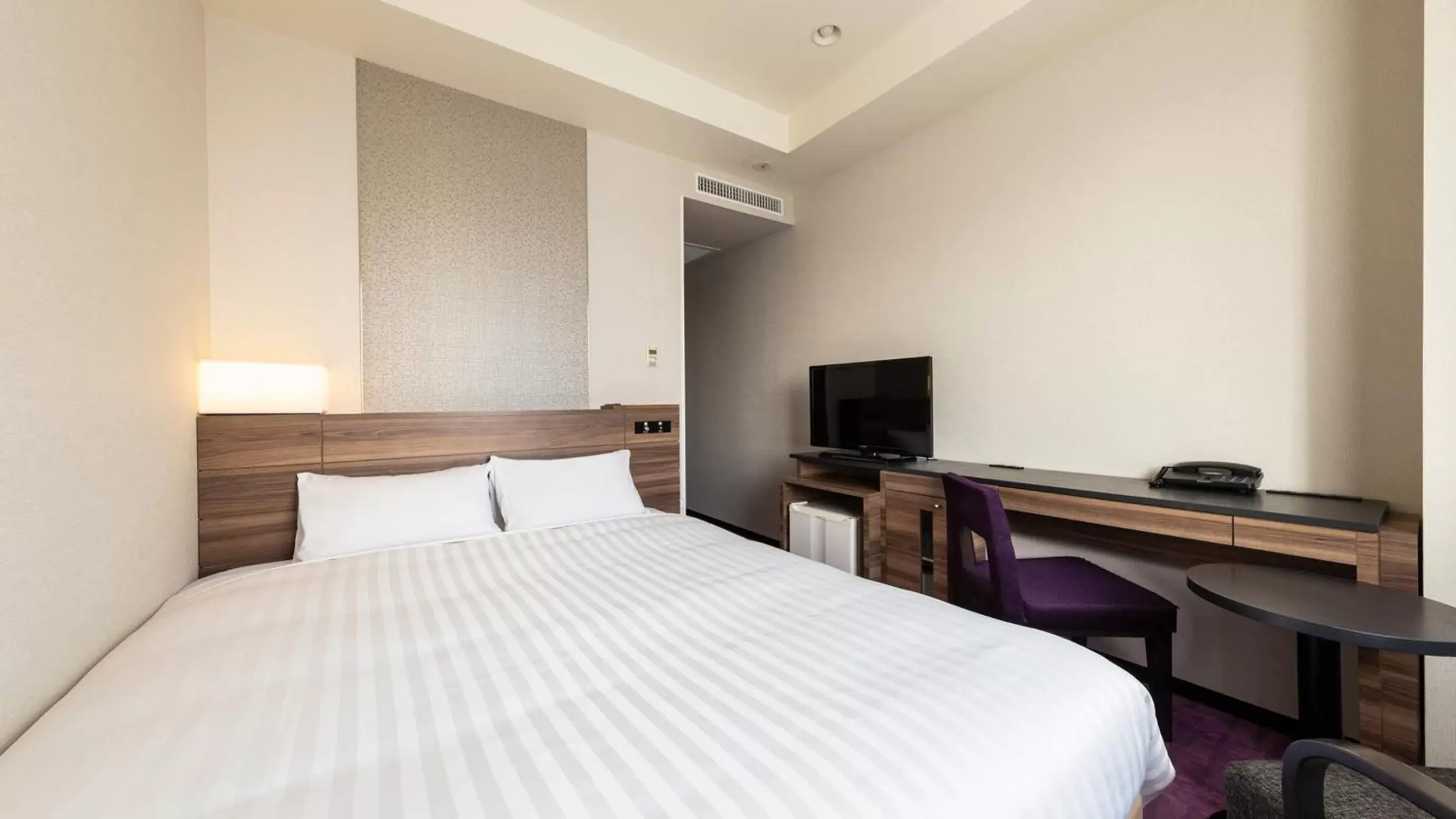 Bed in JR-East Hotel Mets Mito Bed in JR-East Hotel Mets Mito