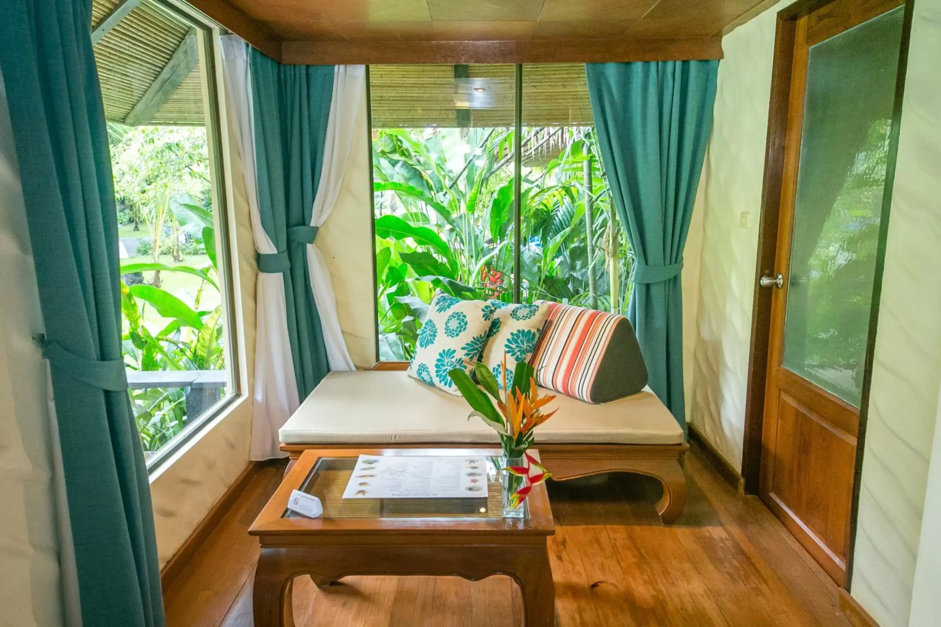 Photo of the whole room, Seating Area in Centara Koh Chang Tropicana Resort