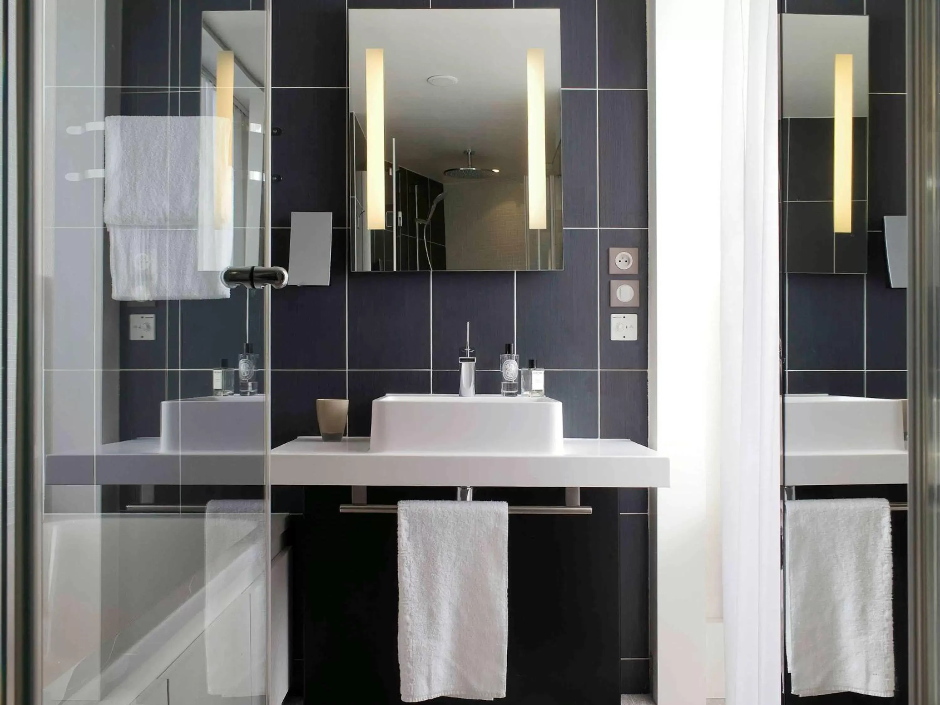 Photo of the whole room, Bathroom in Novotel Suites Paris Issy Les Moulineaux