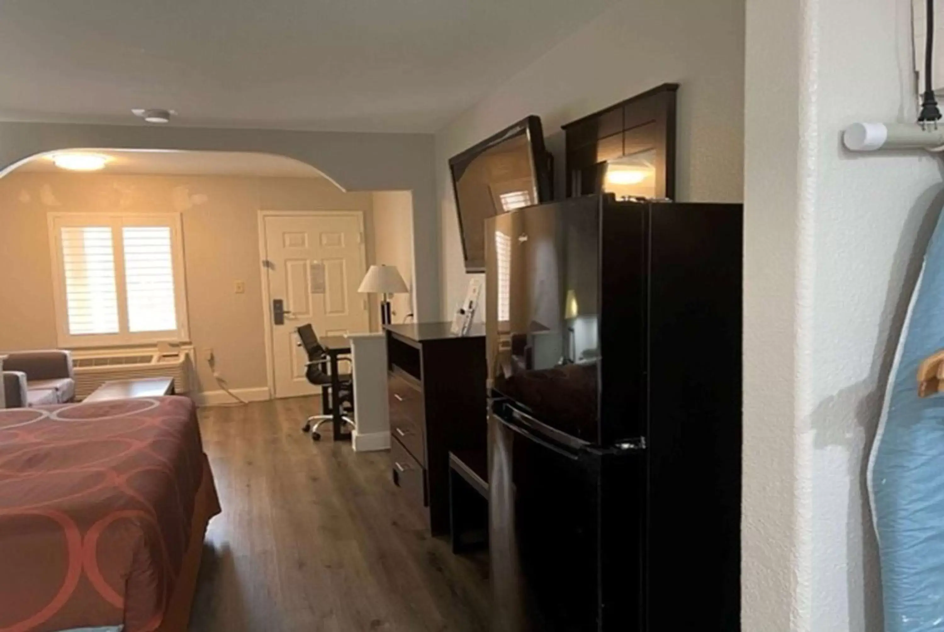 Photo of the whole room, TV/Entertainment Center in Super 8 by Wyndham Baytown/Mont Belvieu