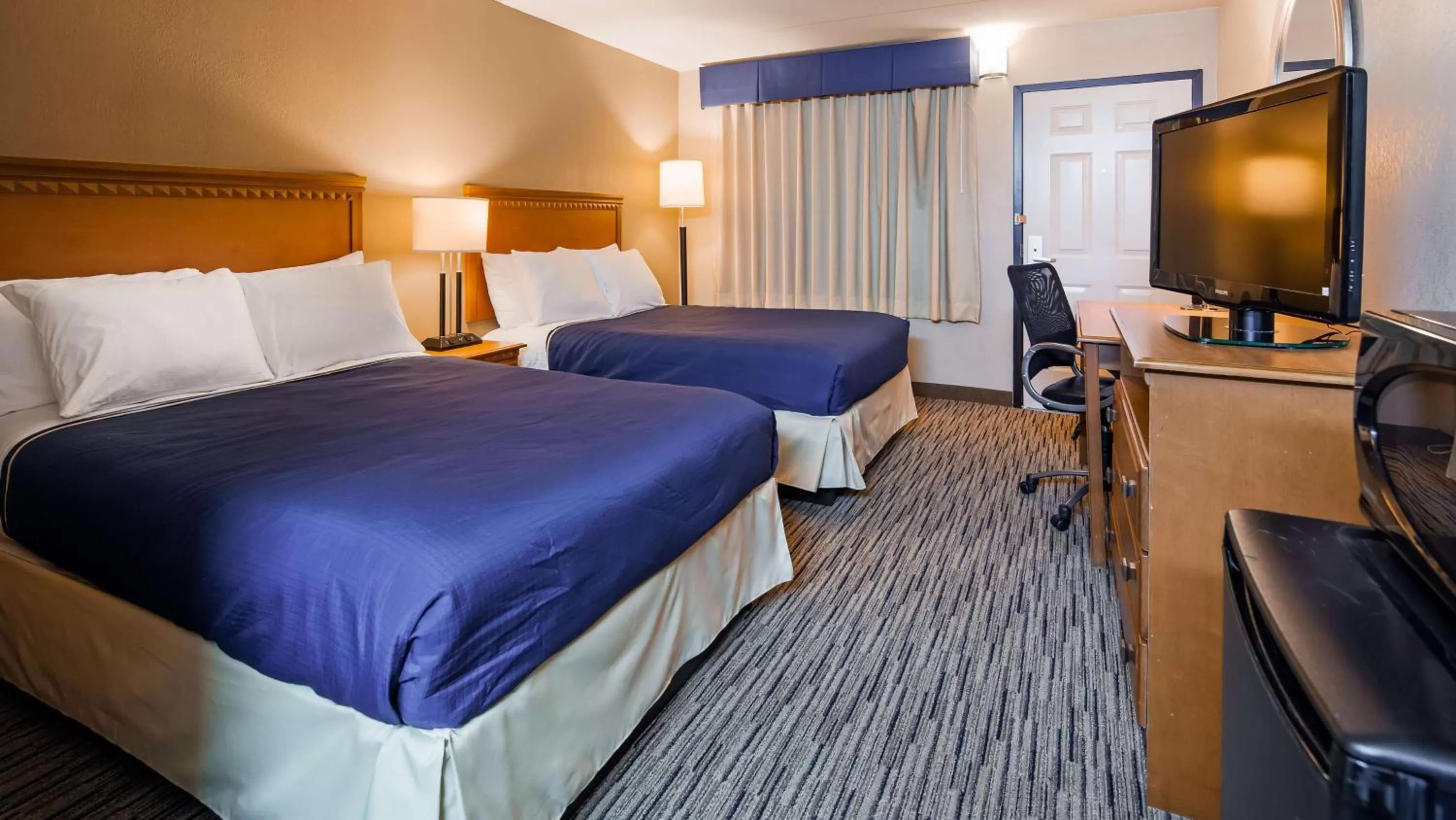 Photo of the whole room, Bed in SureStay Hotel by Best Western Tupelo North