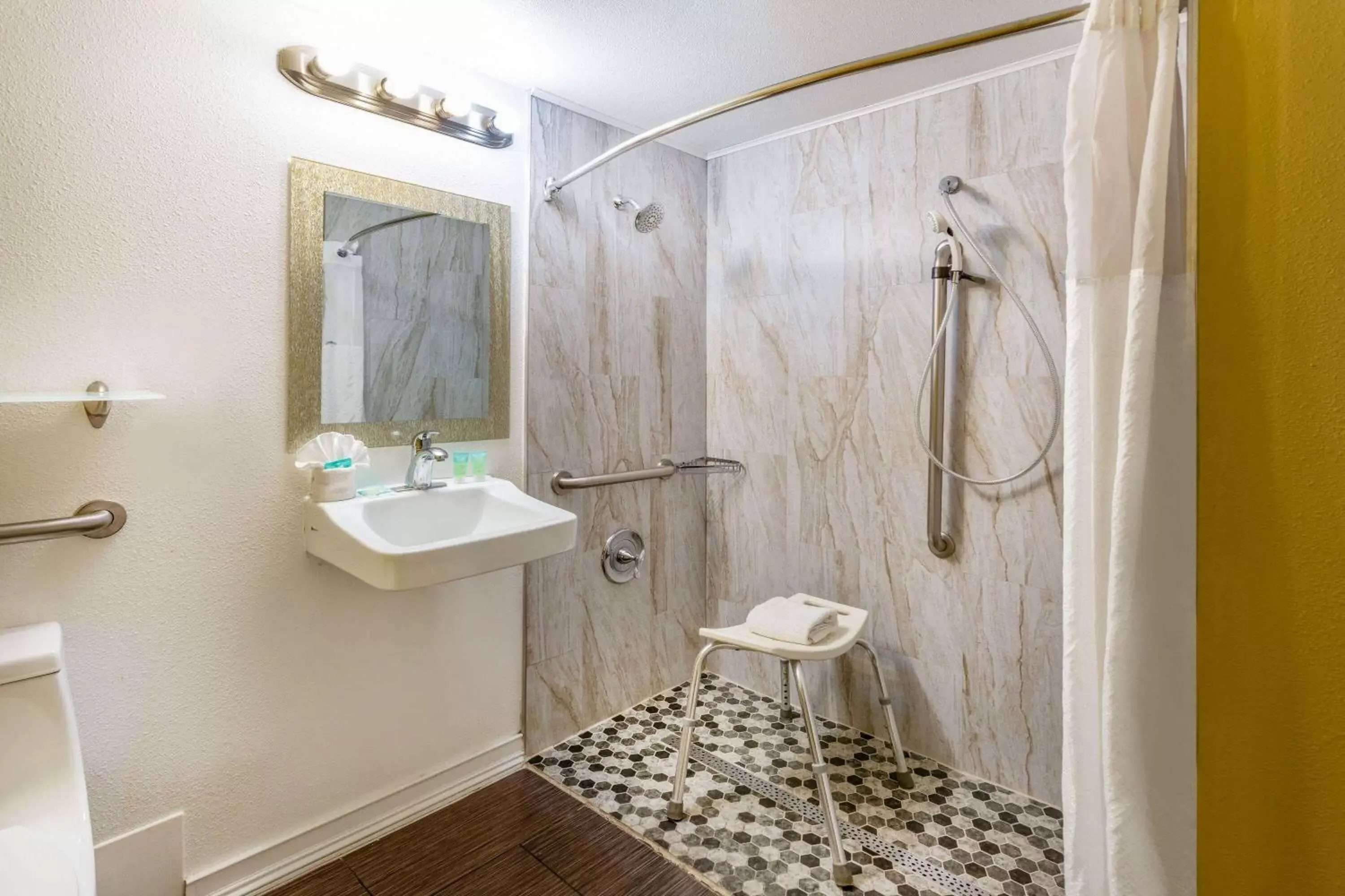 Shower, Bathroom in Super 8 by Wyndham NAU/Downtown Conference Center