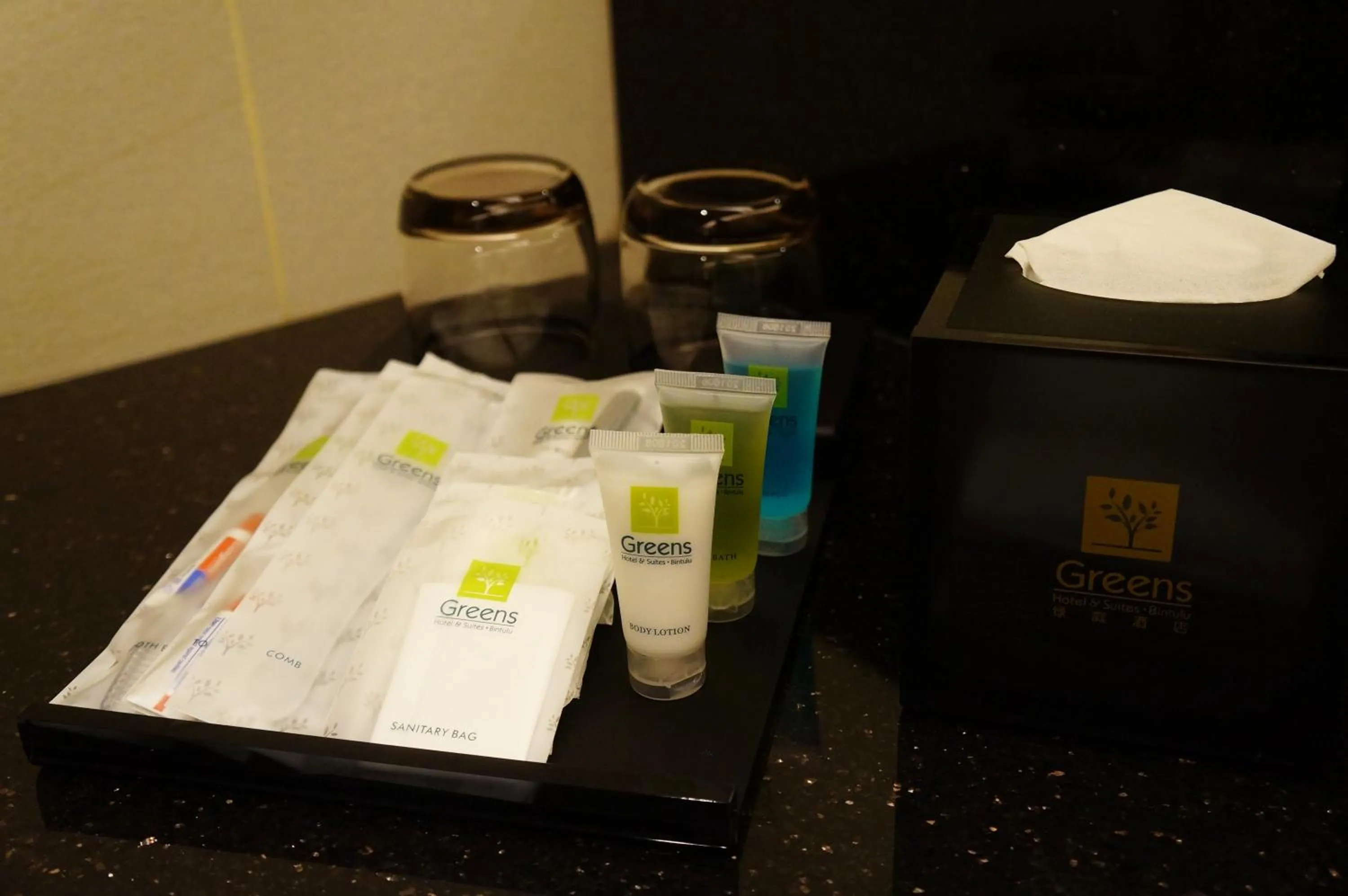 Bathroom in Greens Hotel & Suites