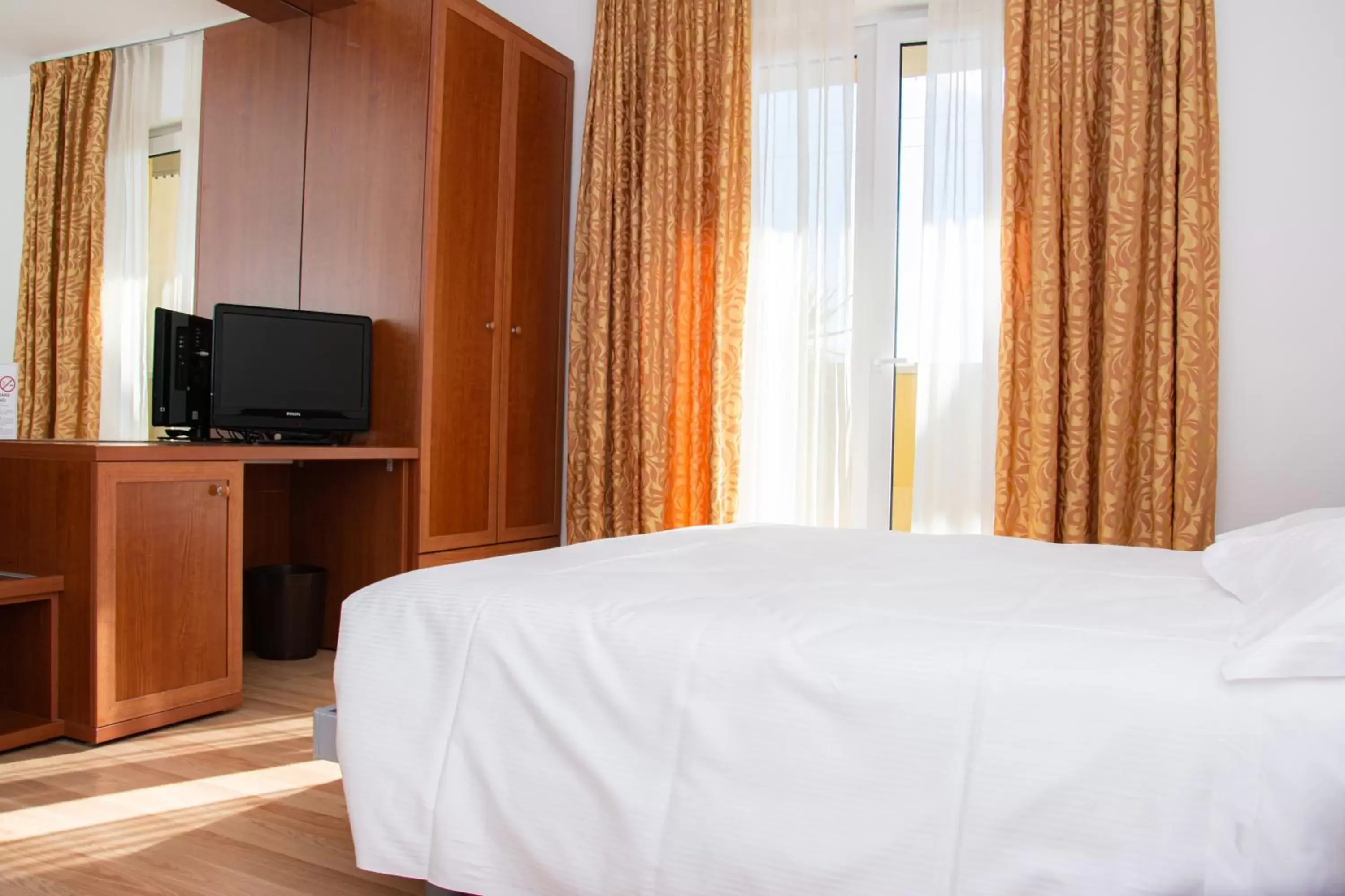 Bed in Hotel Nuova Barcaccia