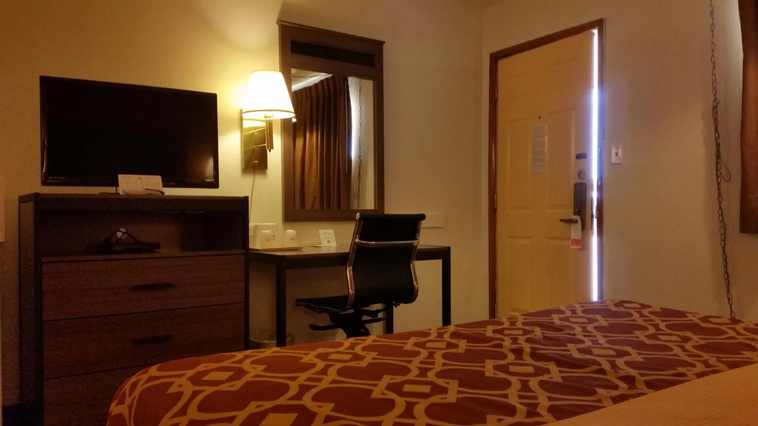 Bed in American Inn Of Liberal