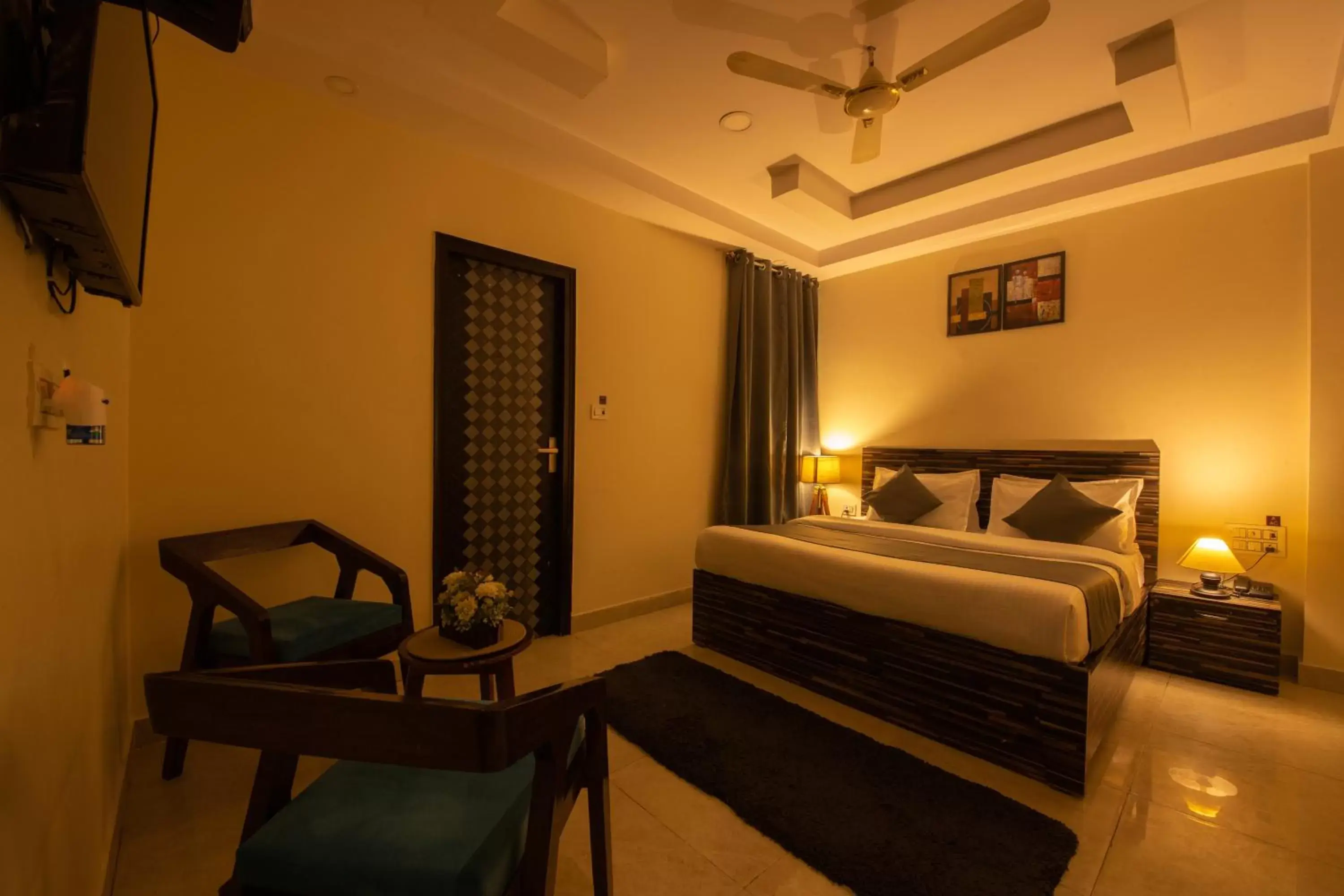 Communal lounge/ TV room, Bed in Perfectstayz Value Umra Grace - Near Haridwar Railway Station Communal lounge/ TV room, Bed in Perfectstayz Value Umra Grace - Near Haridwar Railway Station