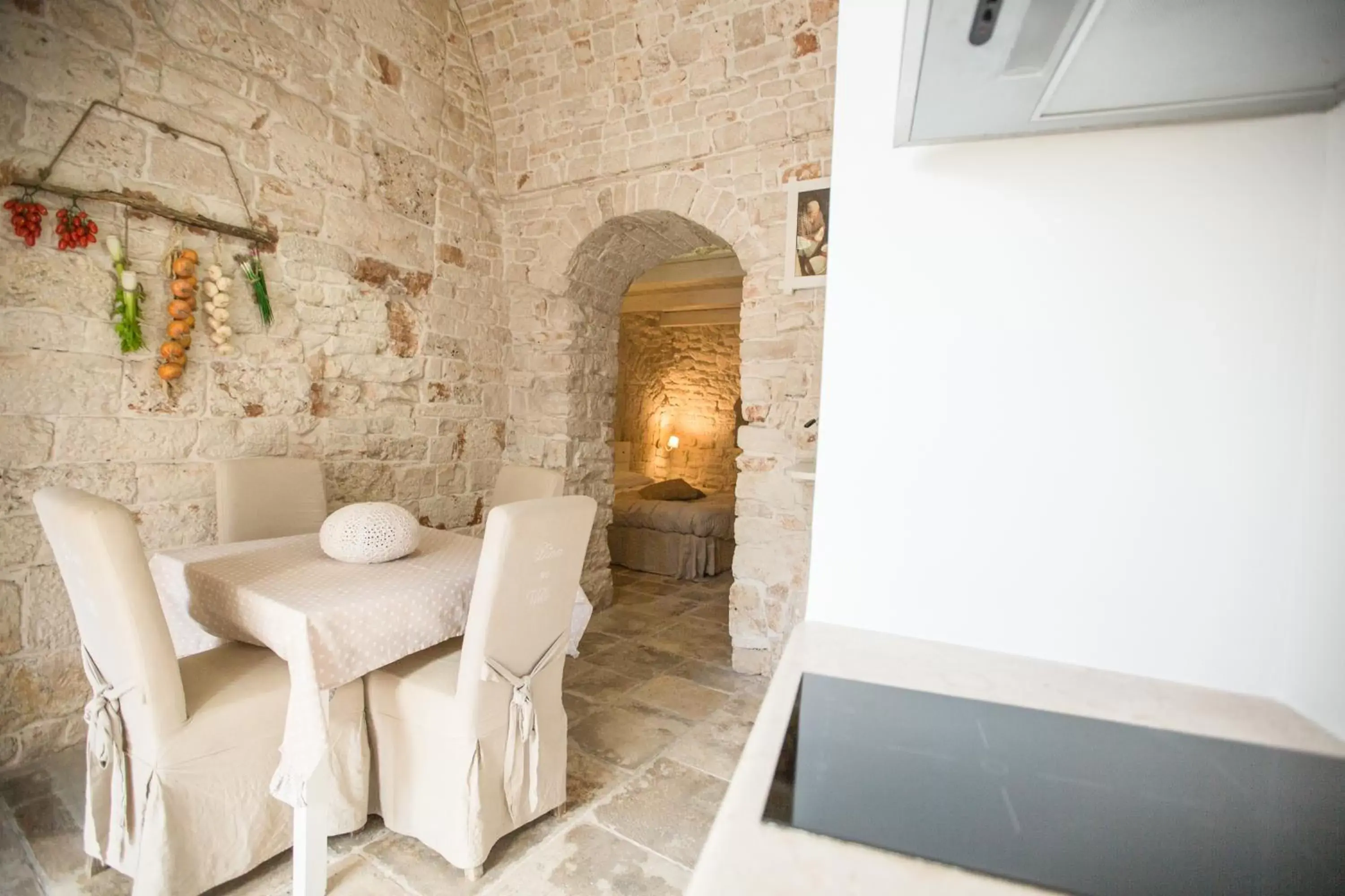 Dining Area in Trulli Antichi Mestieri - Widespread Trulli in the historic center