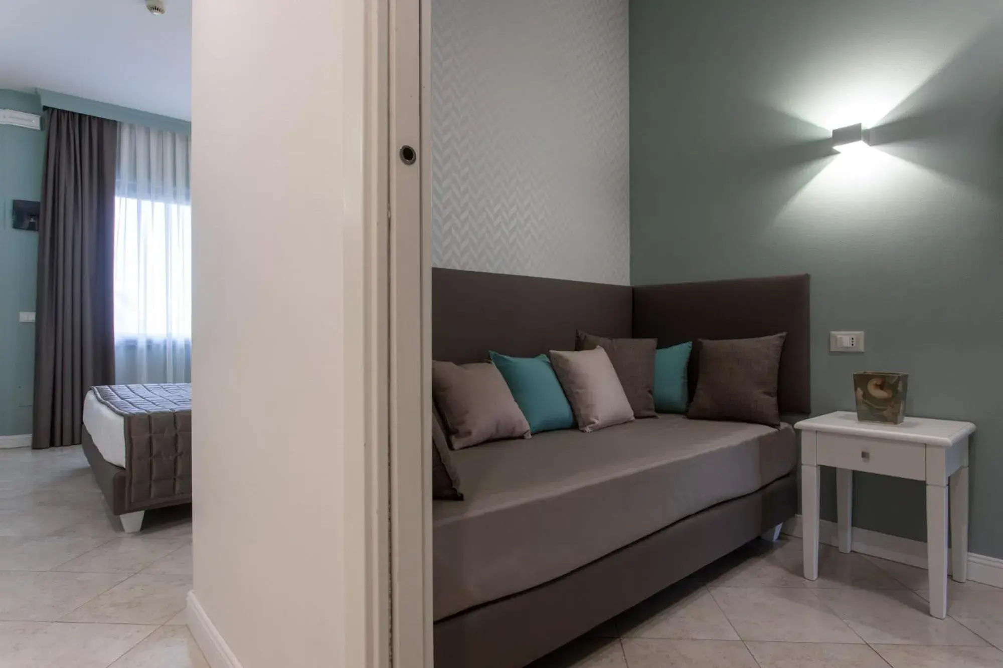 Bed, Seating Area in Hotel Airone isola d'Elba