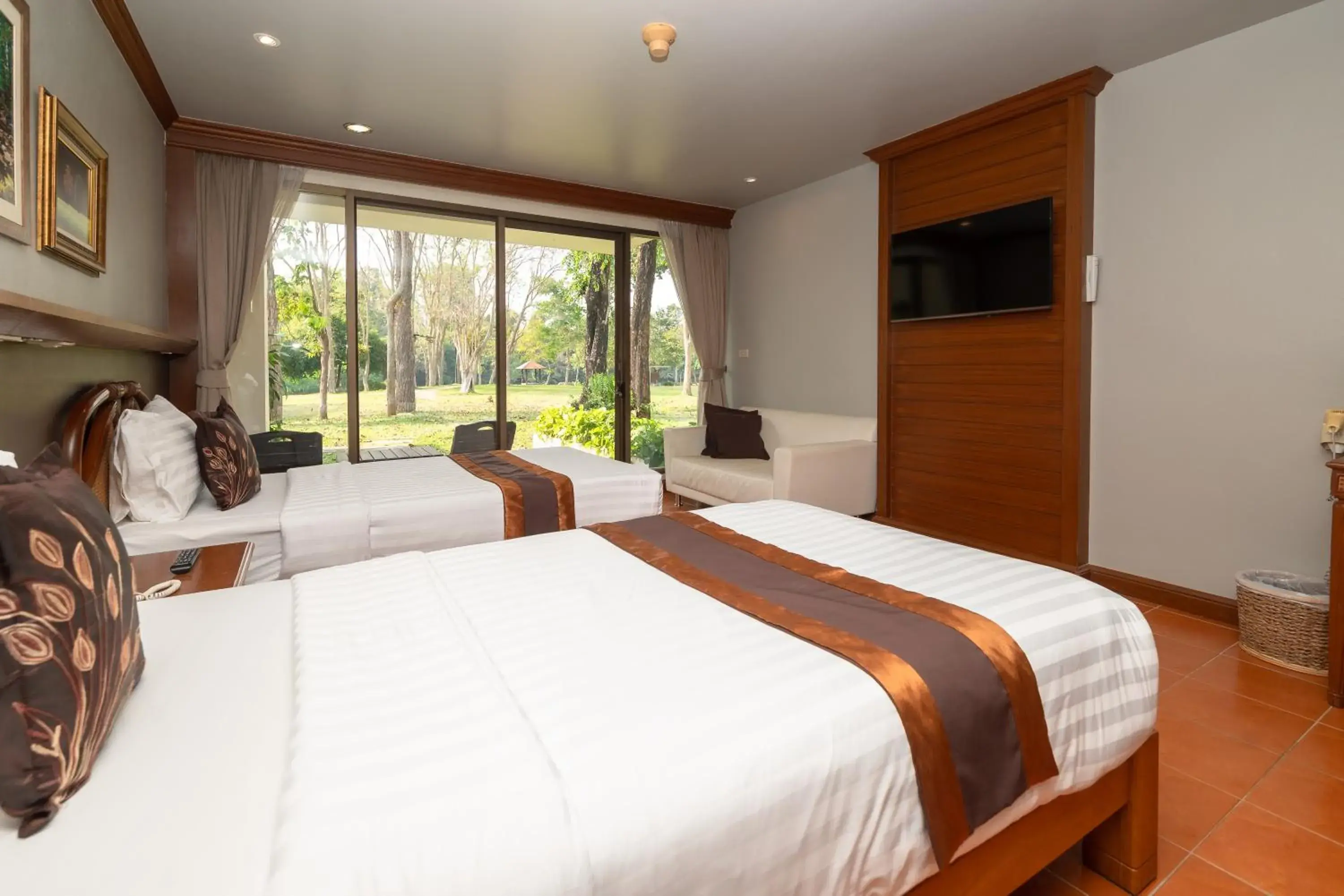 Bed in Comsaed River Kwai Resort SHA