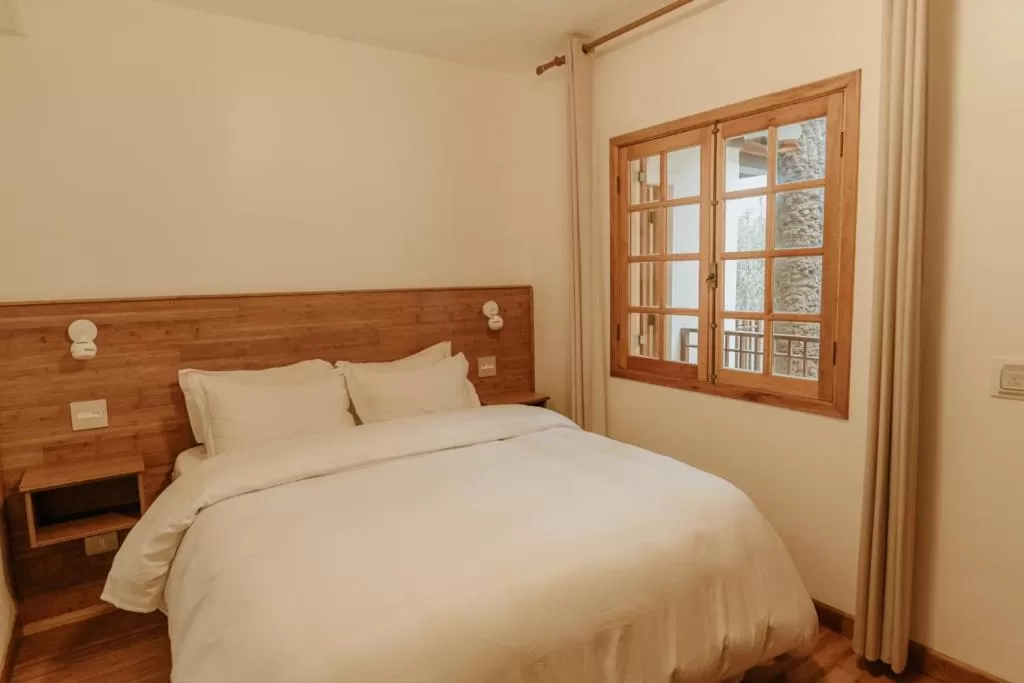 Bed in La Brume Pousada