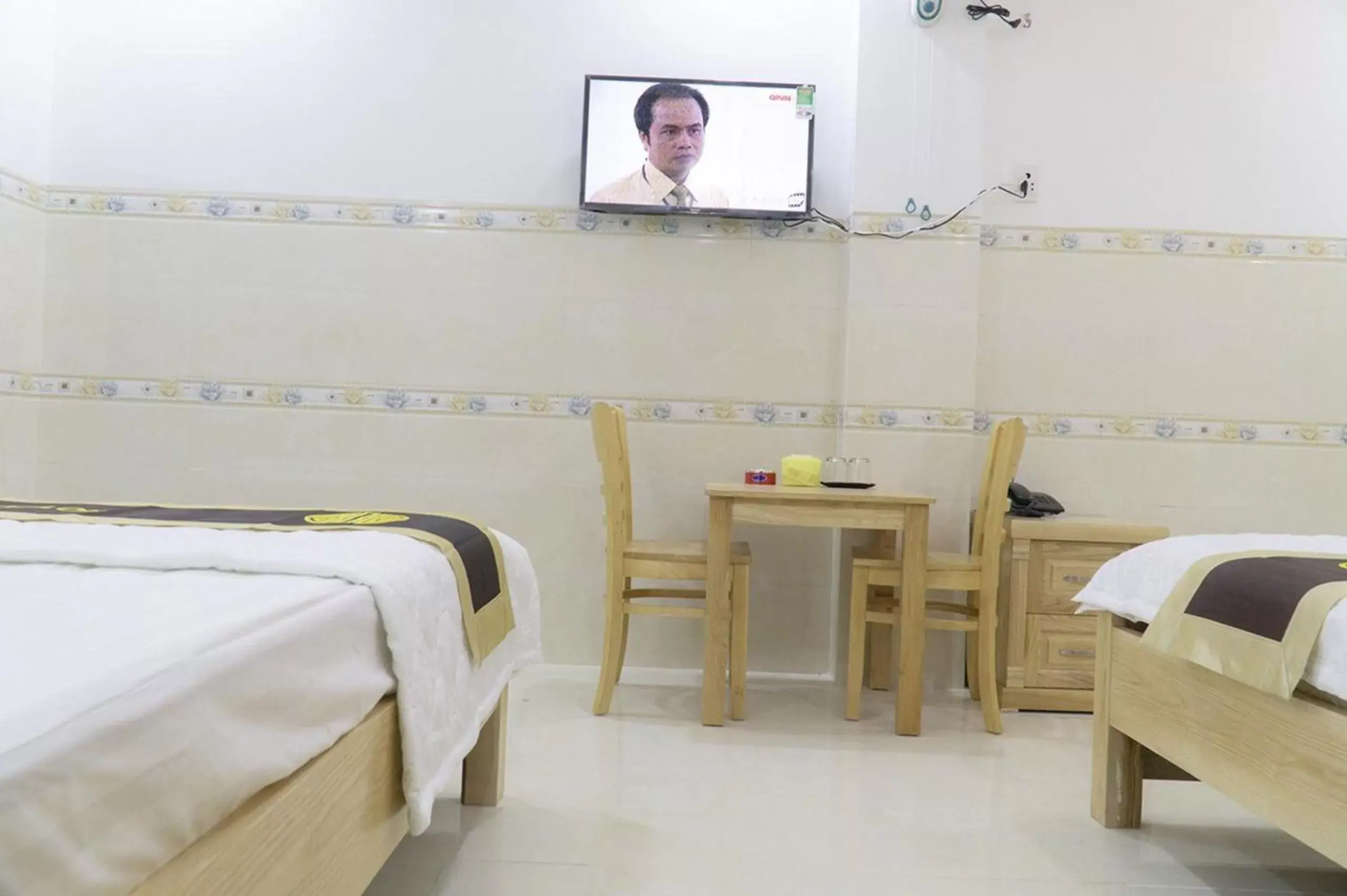 TV and multimedia, Bed in Dai An Binh Tan Hotel TV and multimedia, Bed in Dai An Binh Tan Hotel