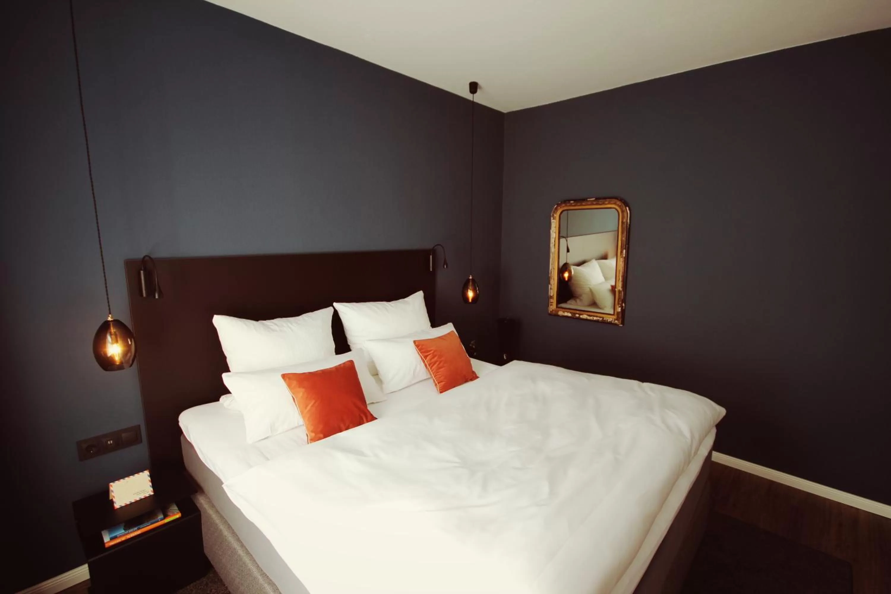 Bed in ONNO Boutique Hotel & Apartments