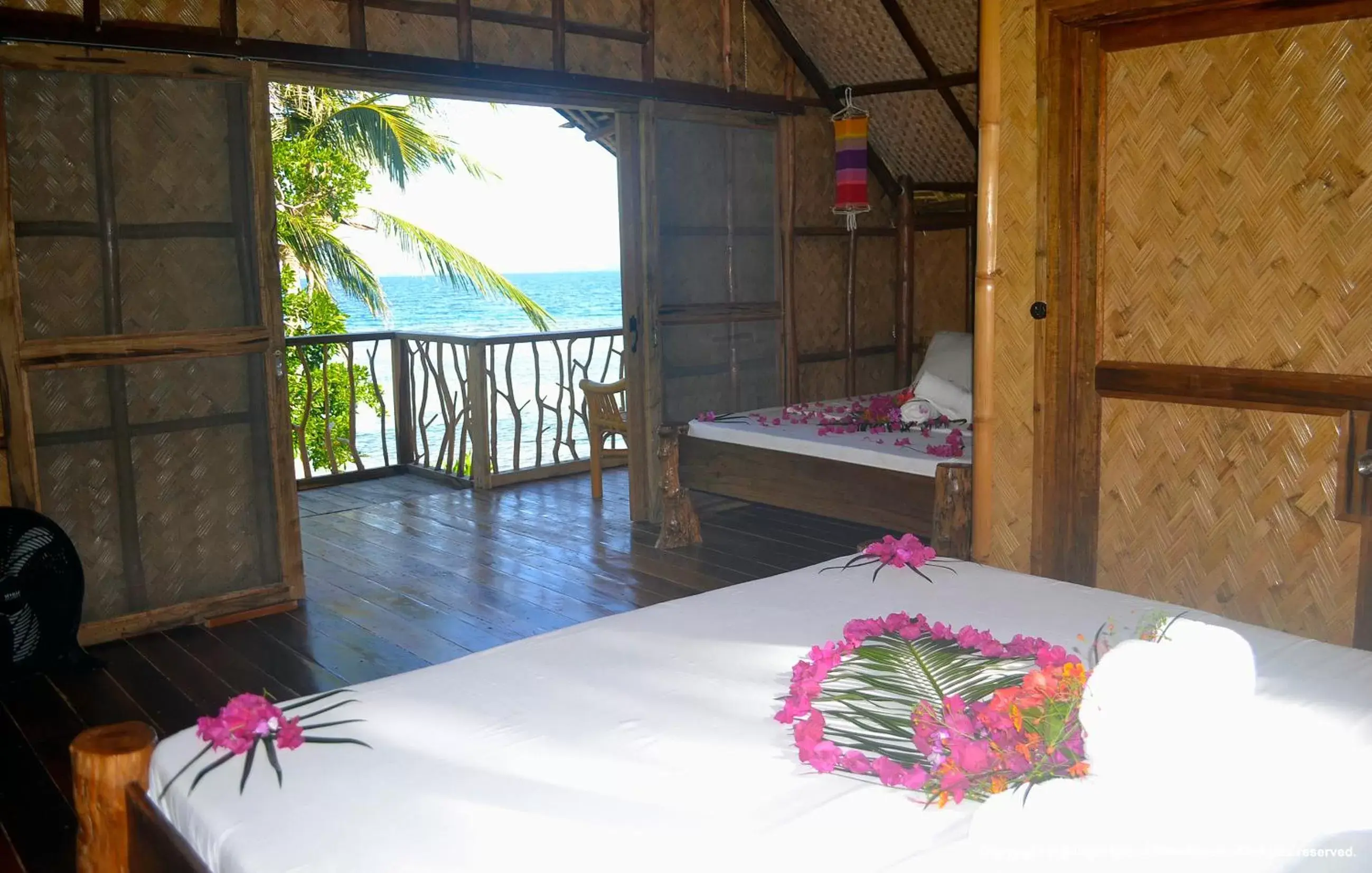 Bedroom in Sangat Island Dive Resort