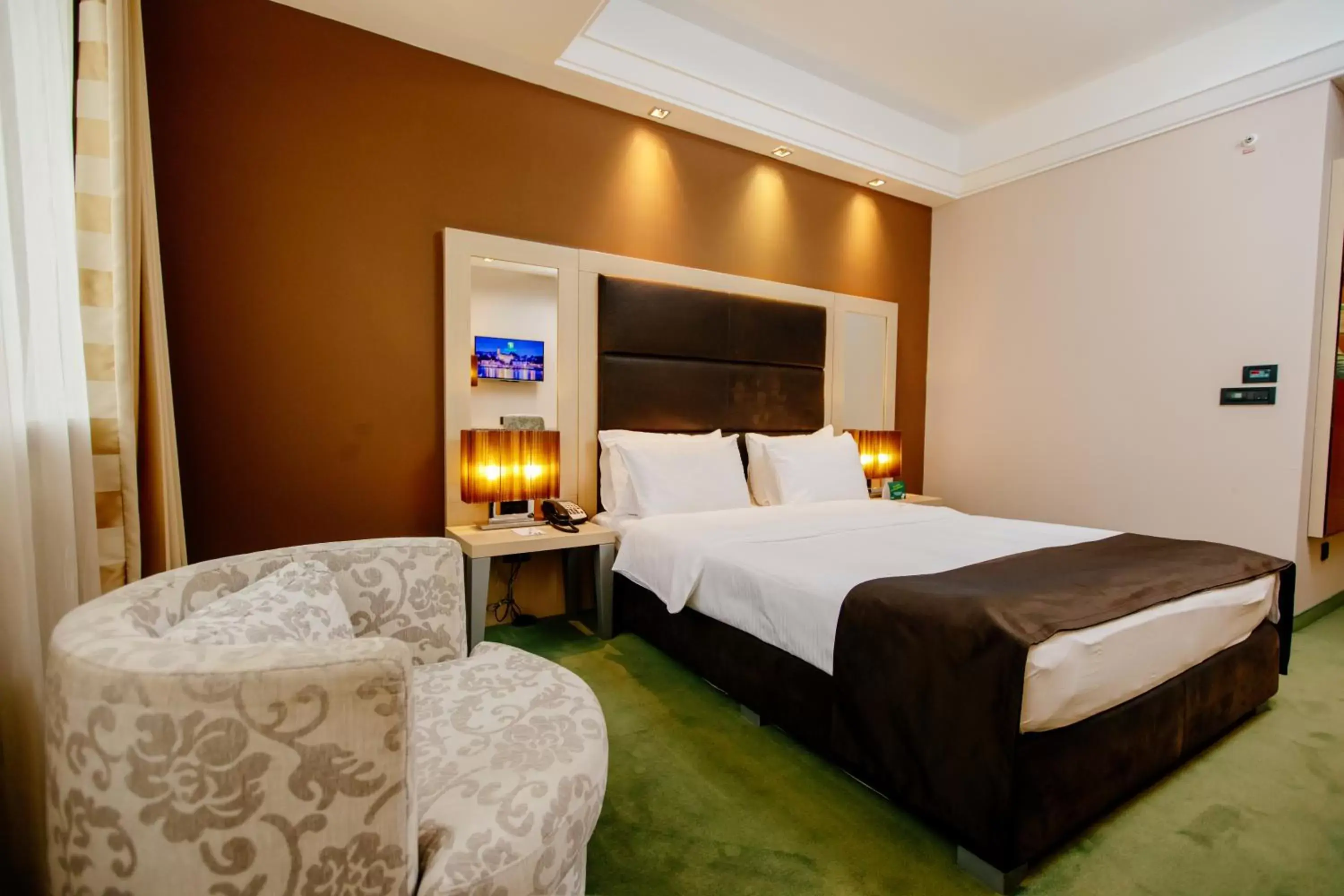 Bed in Holiday Inn Belgrade, an IHG Hotel