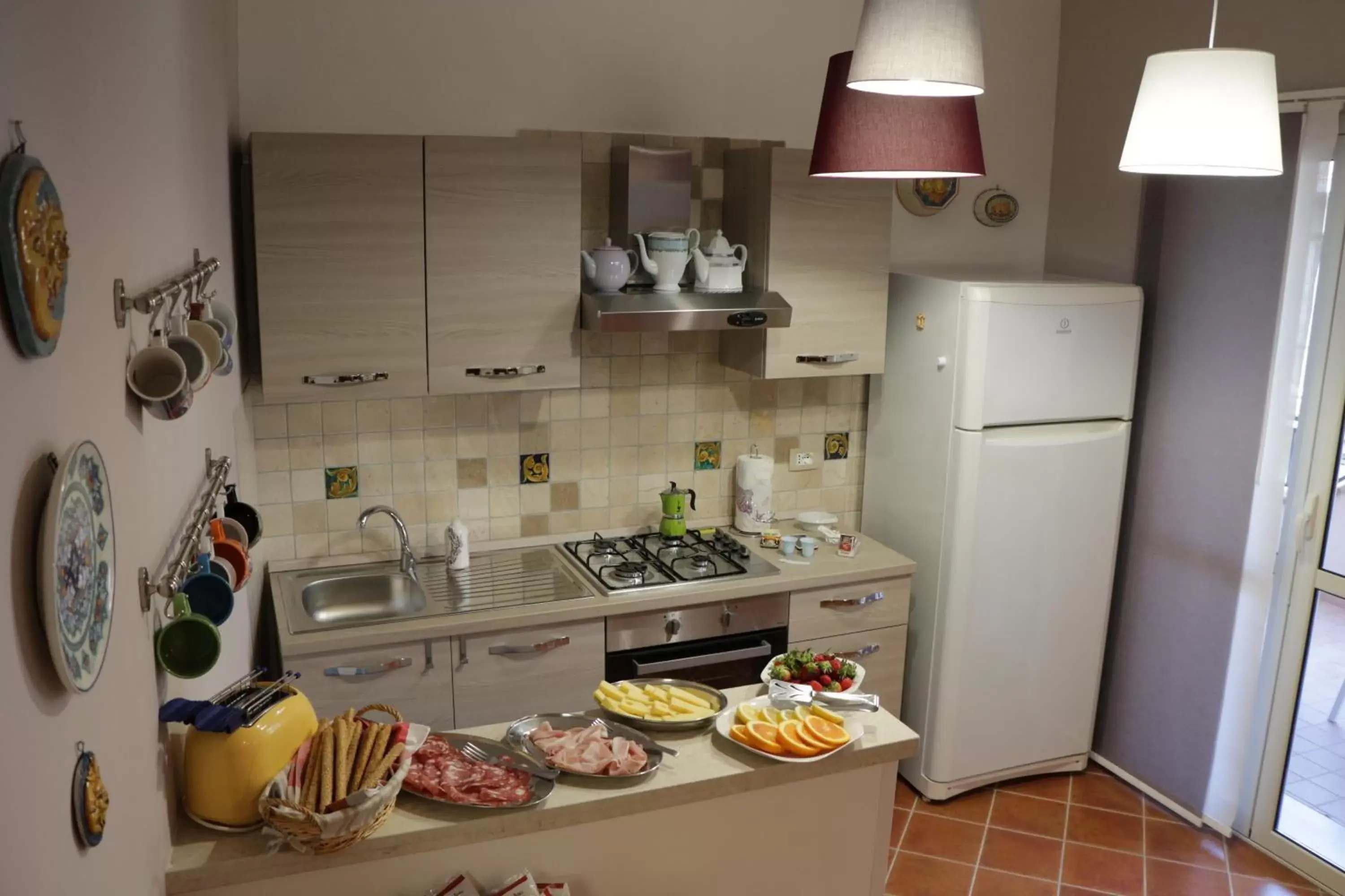 Kitchen/Kitchenette in B&b Artemisia