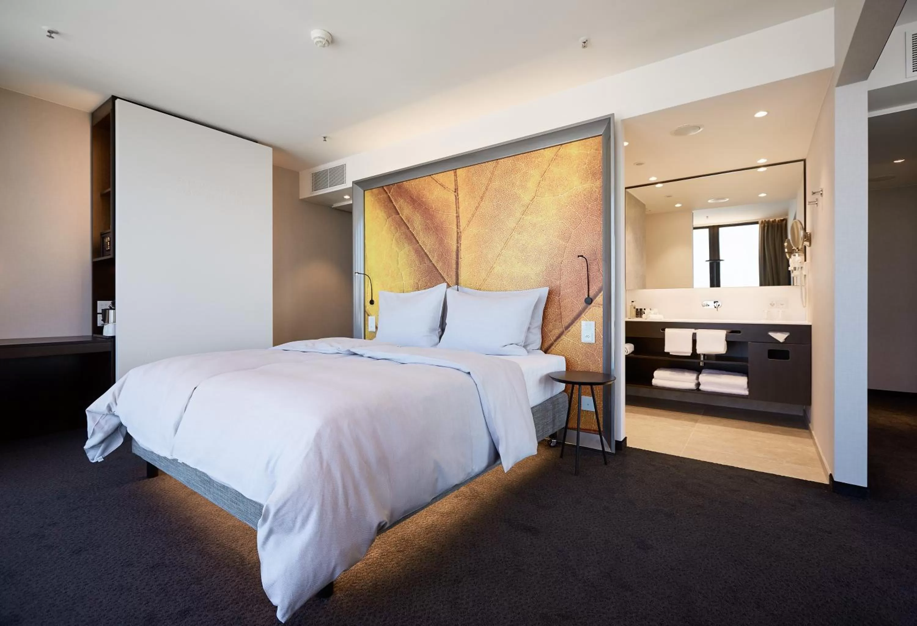 Photo of the whole room, Bed in HYPERION Hotel Basel