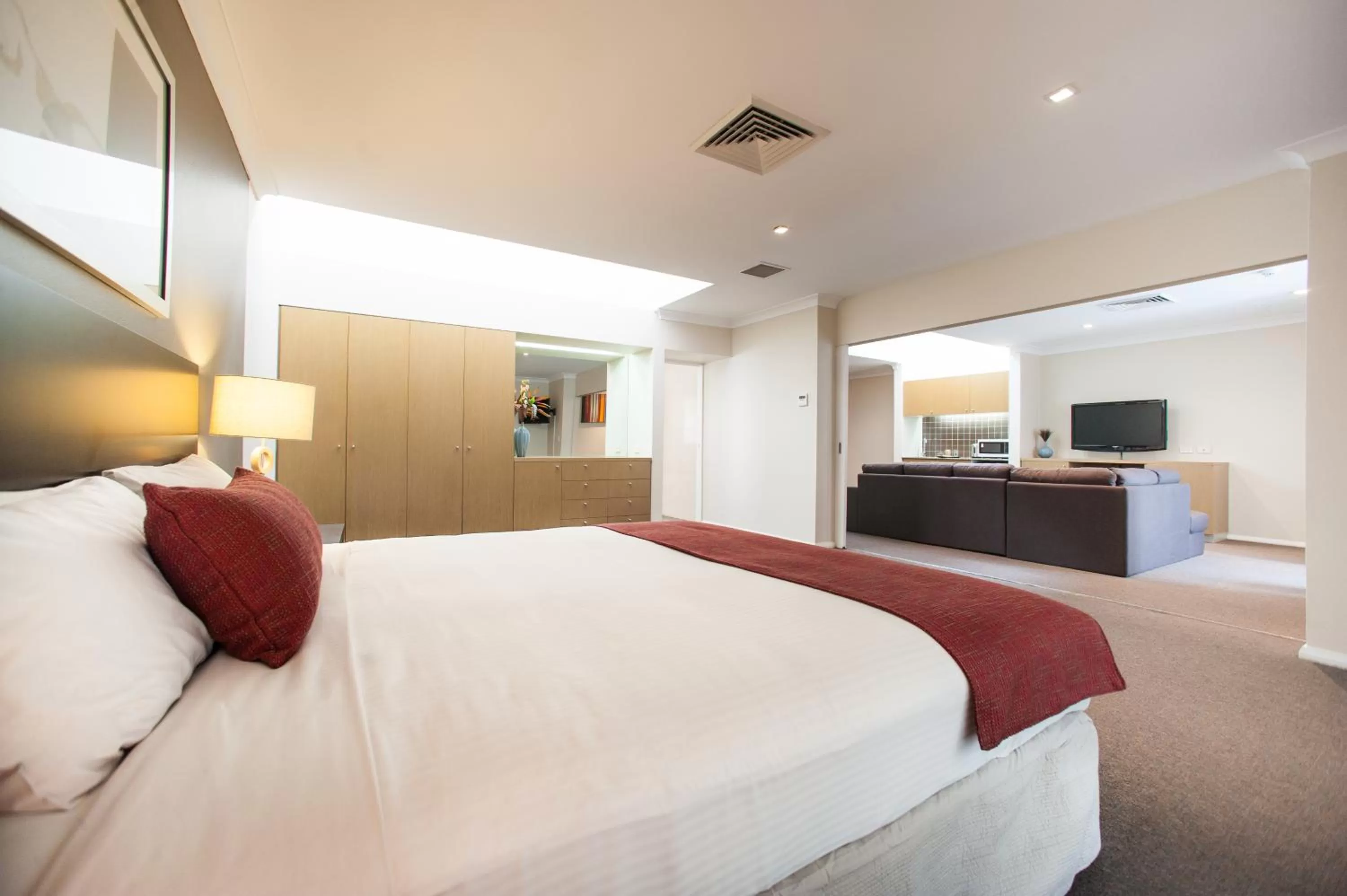 Bed in Ramada Hotel & Suites by Wyndham Cabramatta