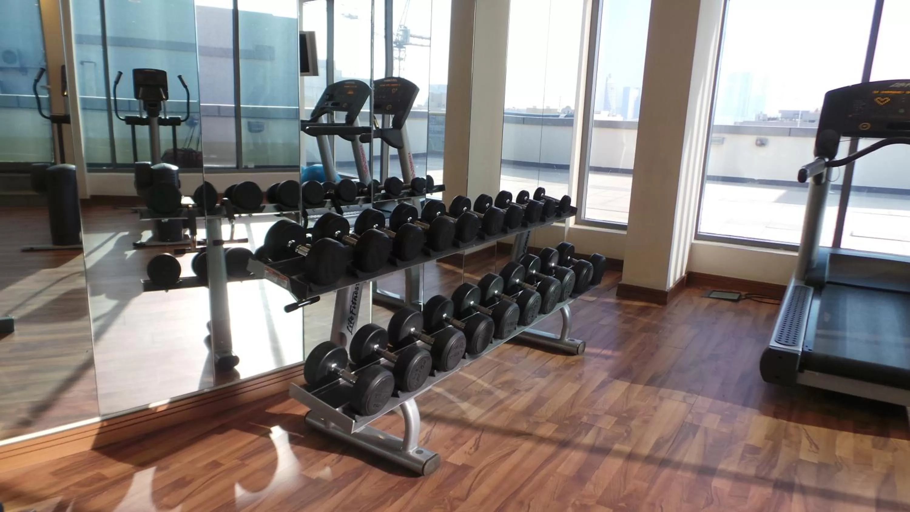 Fitness centre/facilities in Xclusive Maples Hotel Apartment