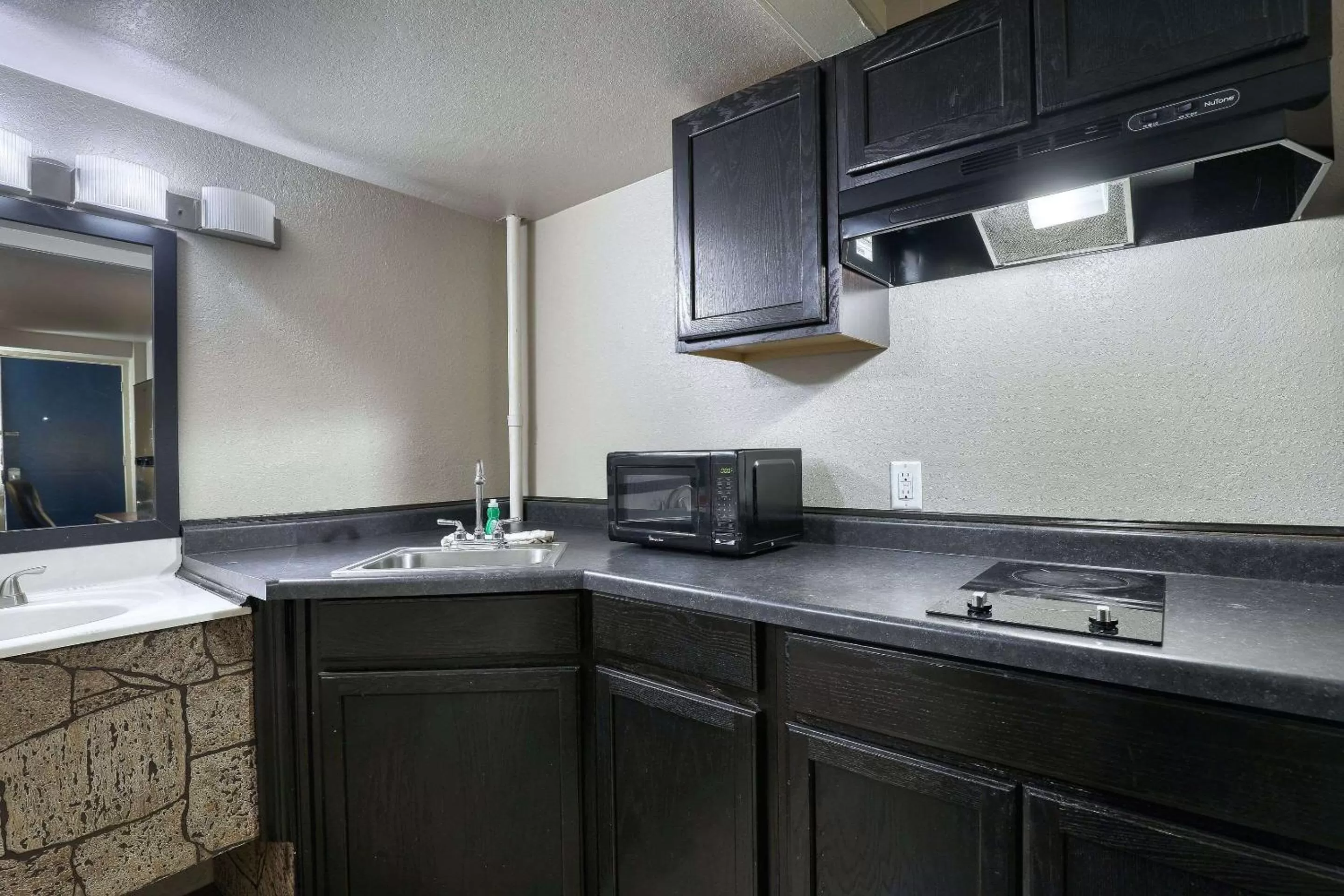 Bedroom in Suburban Studios Neenah-Appleton