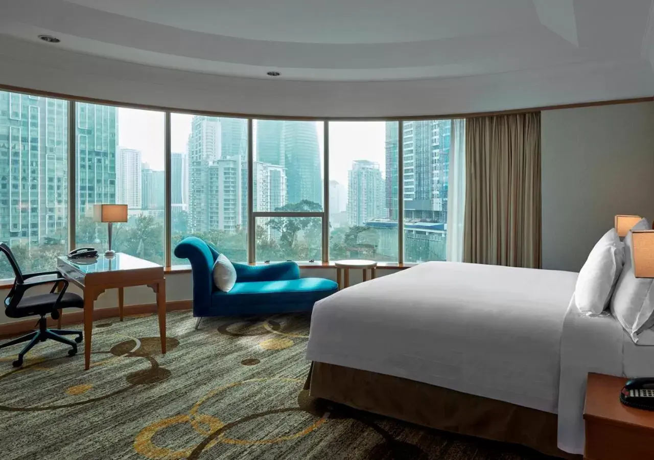 Bed in Pullman Kuala Lumpur City Centre Hotel & Residences