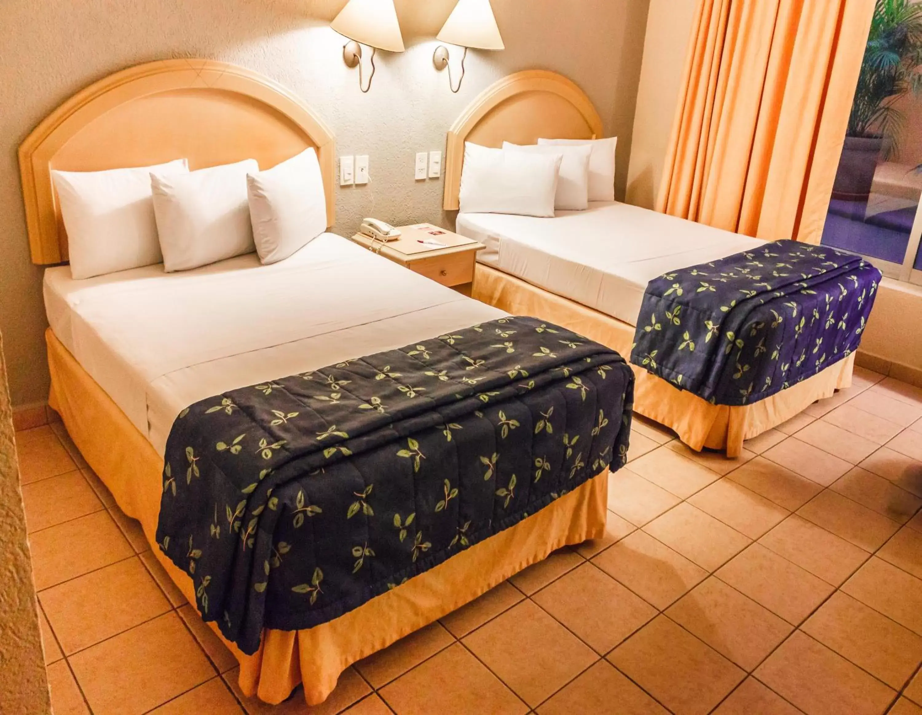 Bed in Plaza Inn Express Bed in Plaza Inn Express