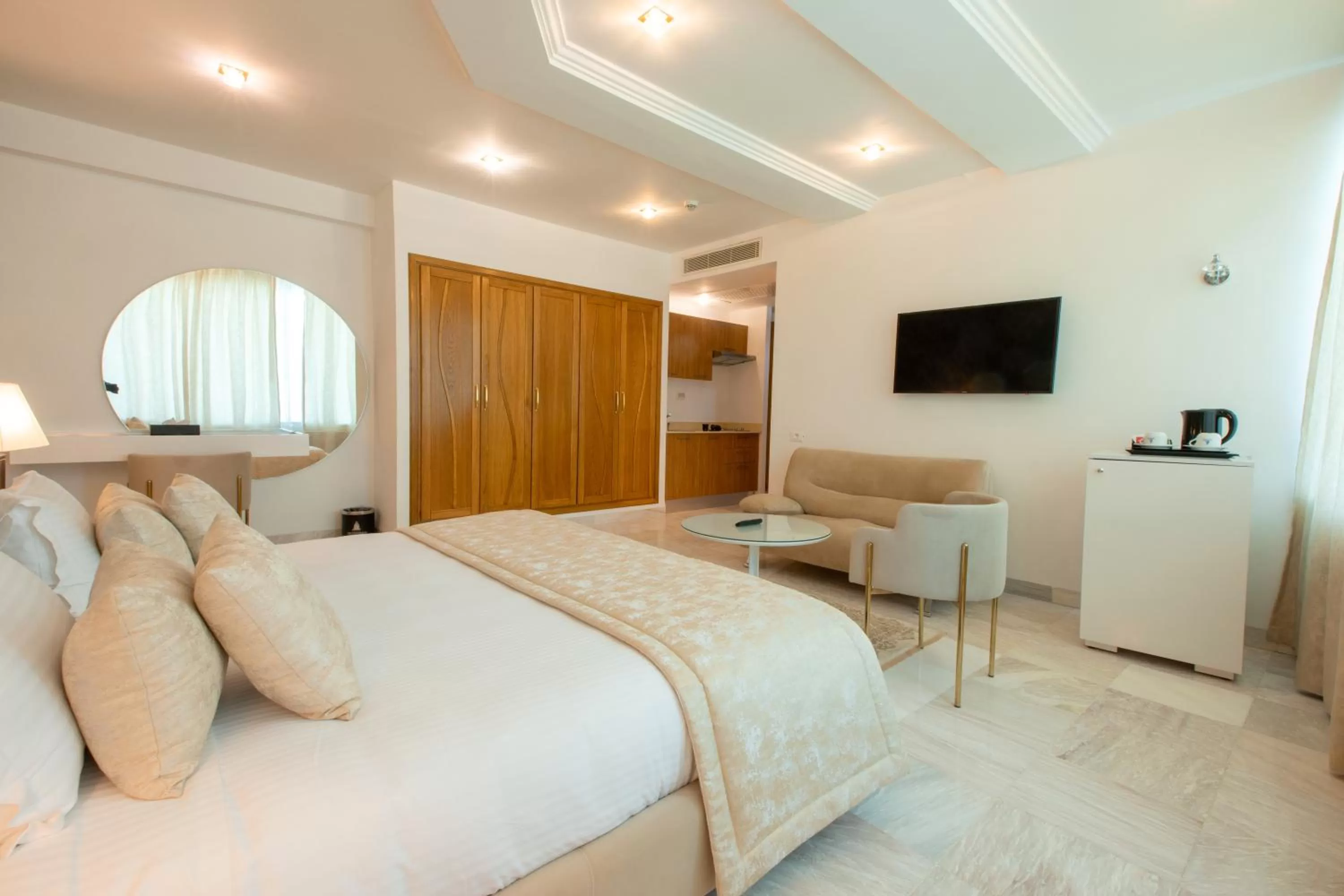 Bed in The Penthouse Suites Hotel