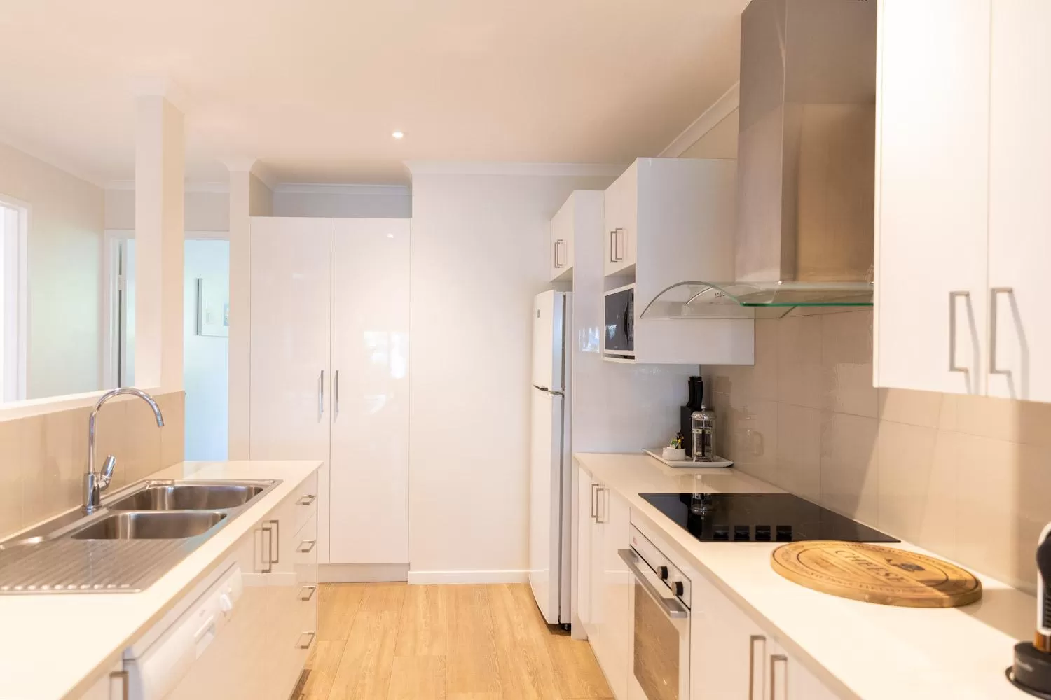 Kitchen or kitchenette in Beaches Holiday Apartments - Official Onsite Reception & Check In