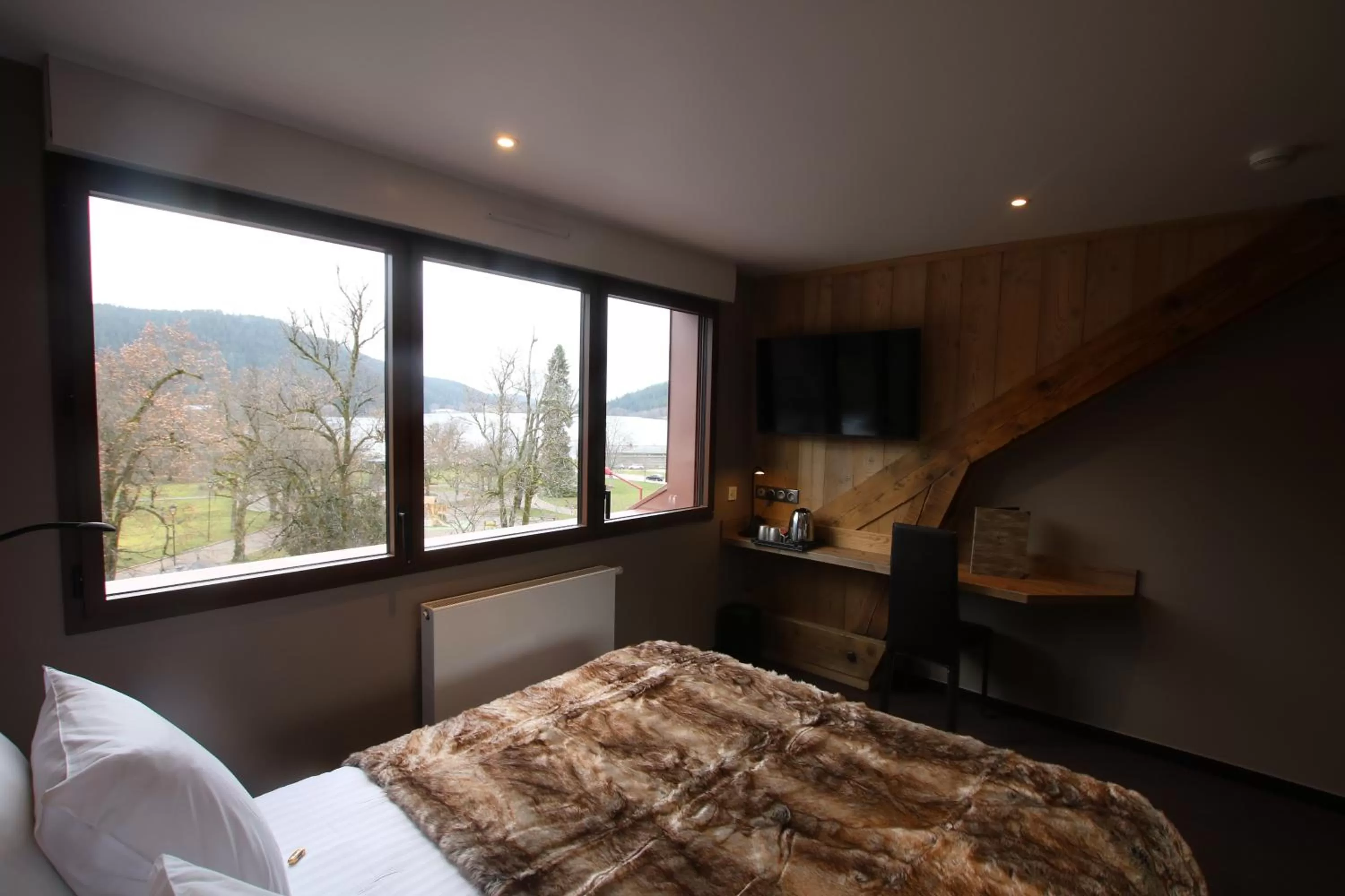 Photo of the whole room, Bed in Les Loges Du Parc