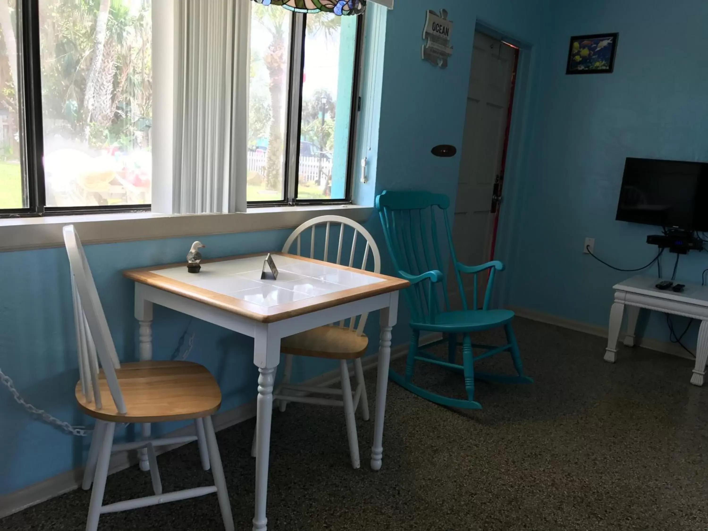 Living room, Dining Area in South Beach Inn - Cocoa Beach