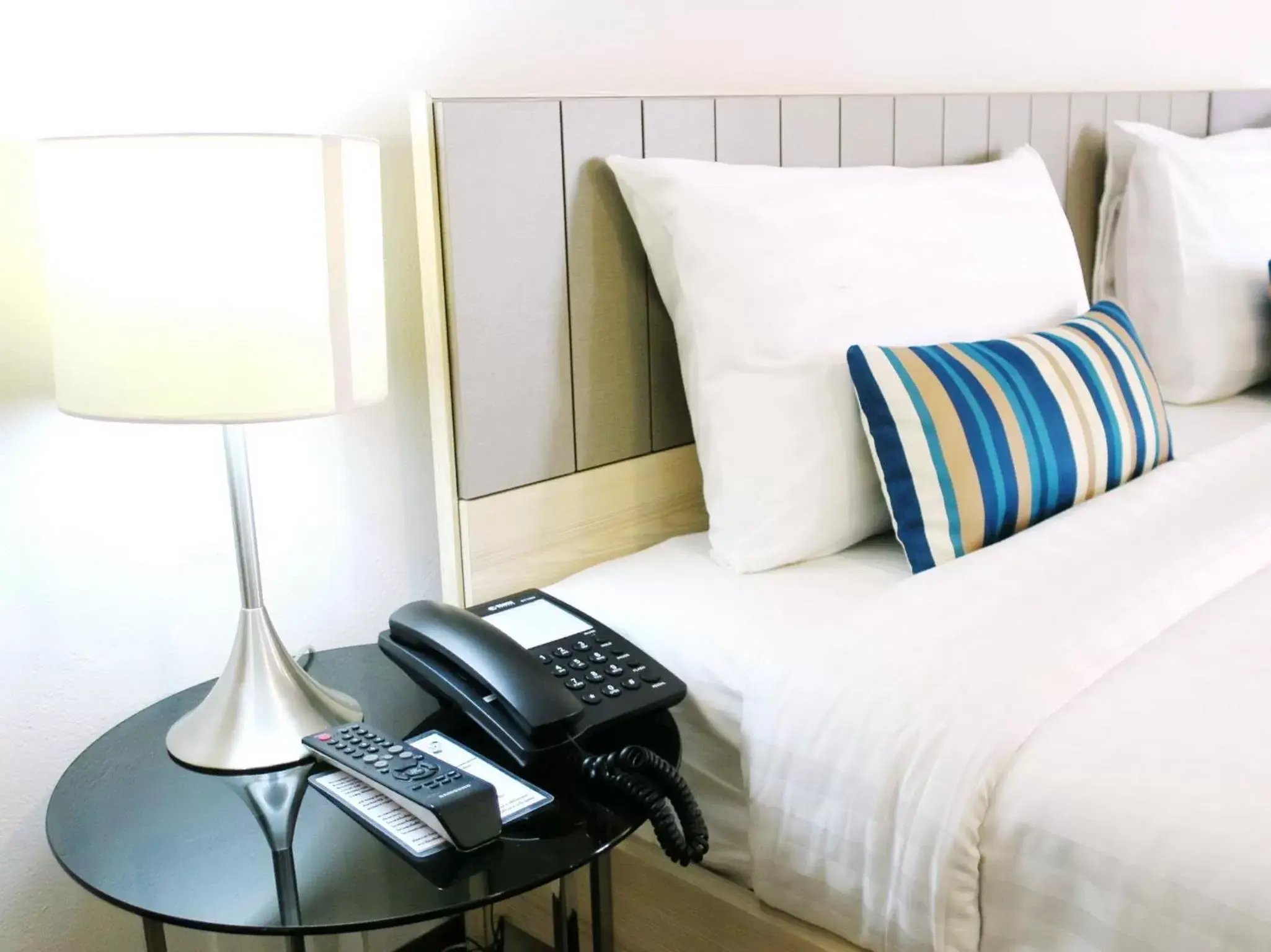 Bed in Samran Place Hotel