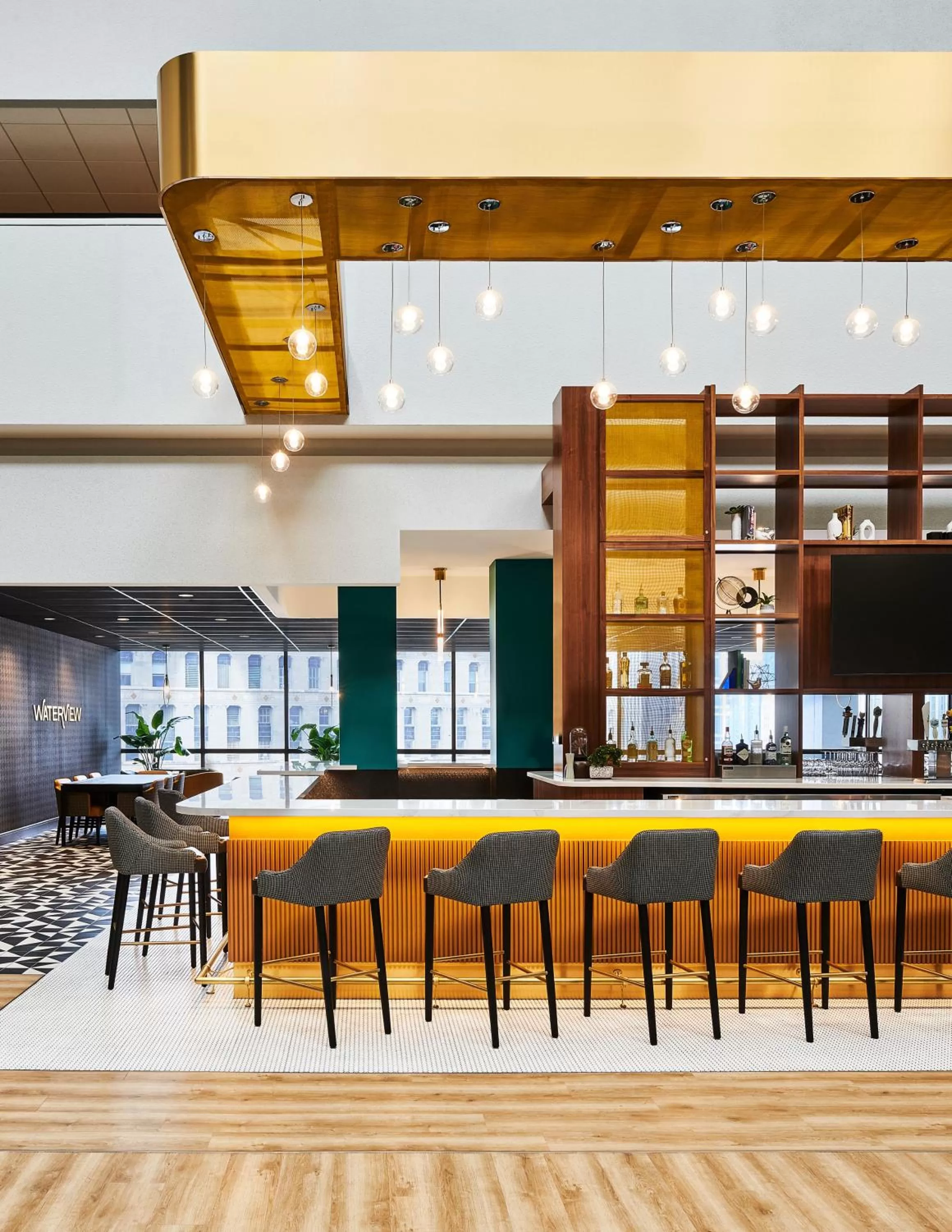 Lounge or bar in voco Chicago Downtown - Riverwalk by IHG