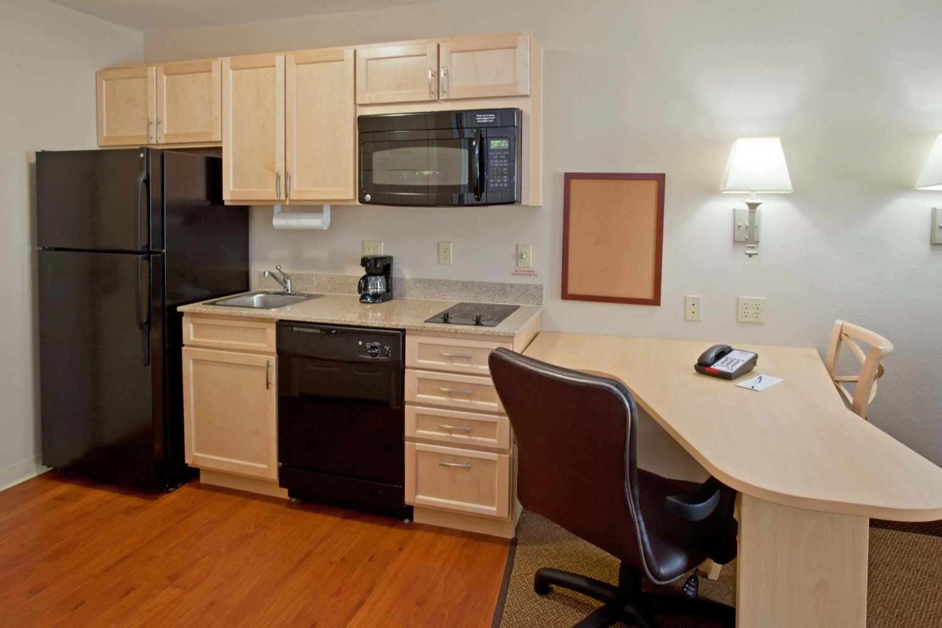 Photo of the whole room, Kitchen/Kitchenette in Candlewood Suites Houston The Woodlands, an IHG Hotel