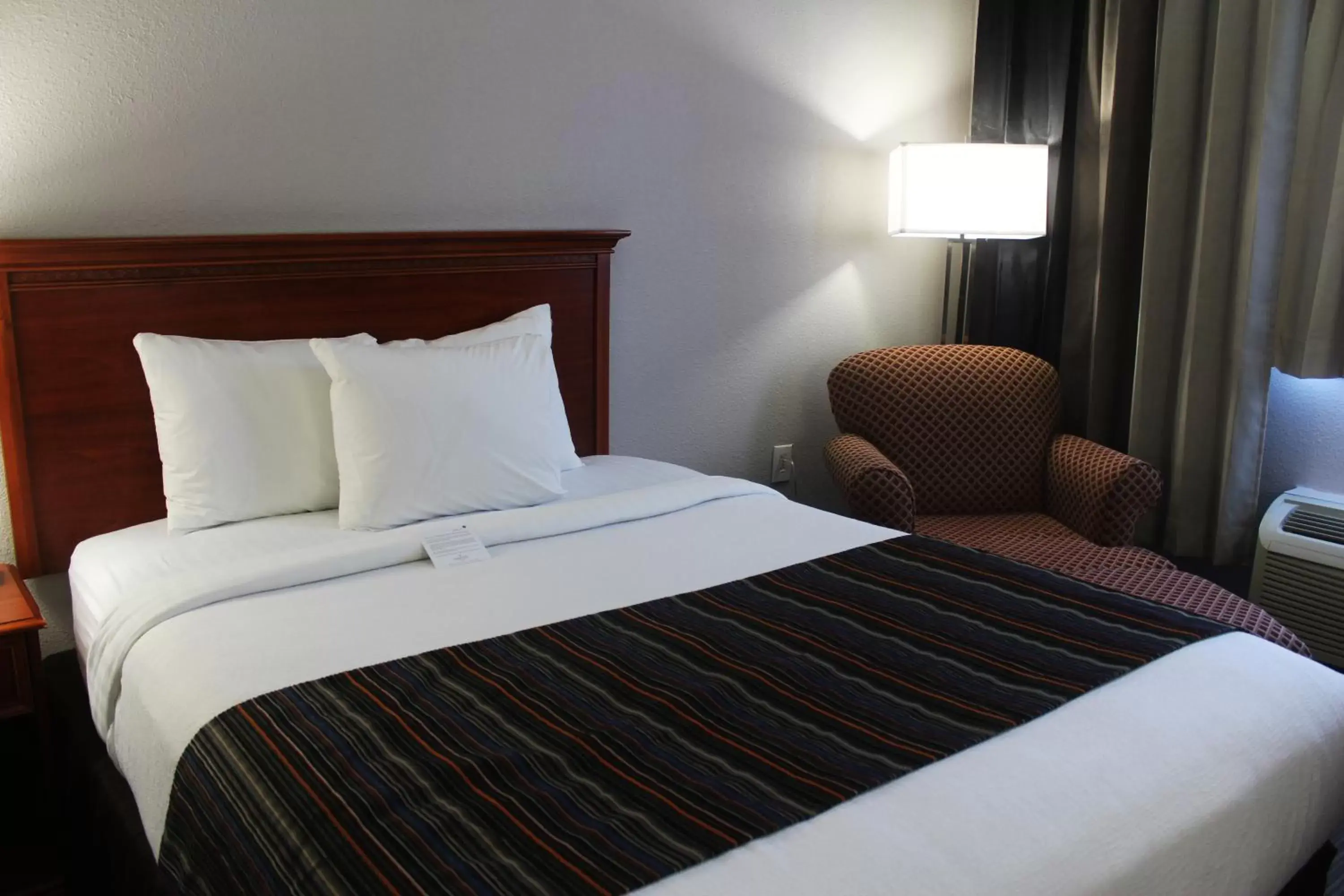 Bed in Country Inn & Suites by Radisson, Lackland AFB (San Antonio), TX