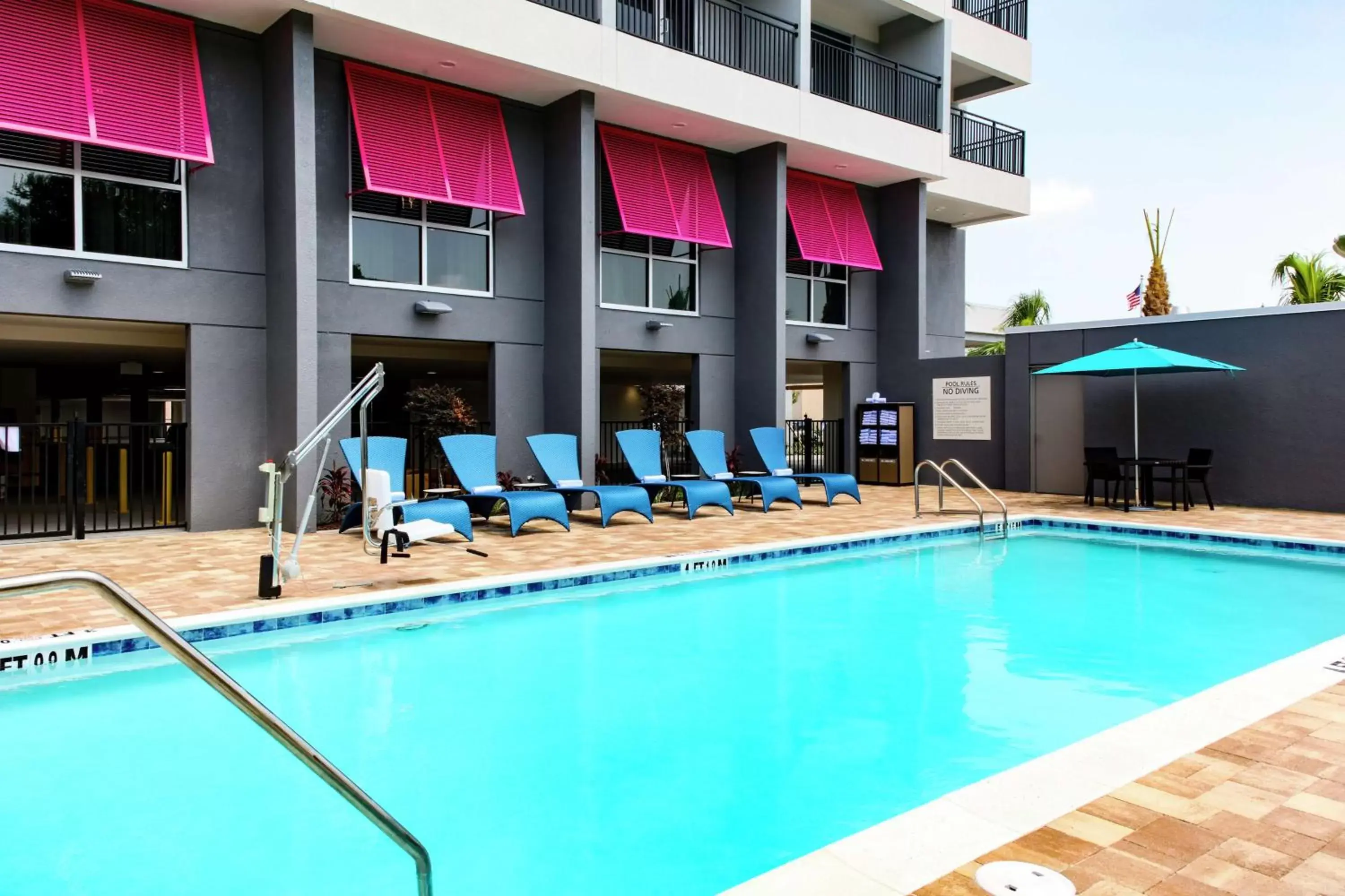 Pool view, Swimming Pool in Hampton Inn Dunedin, Fl