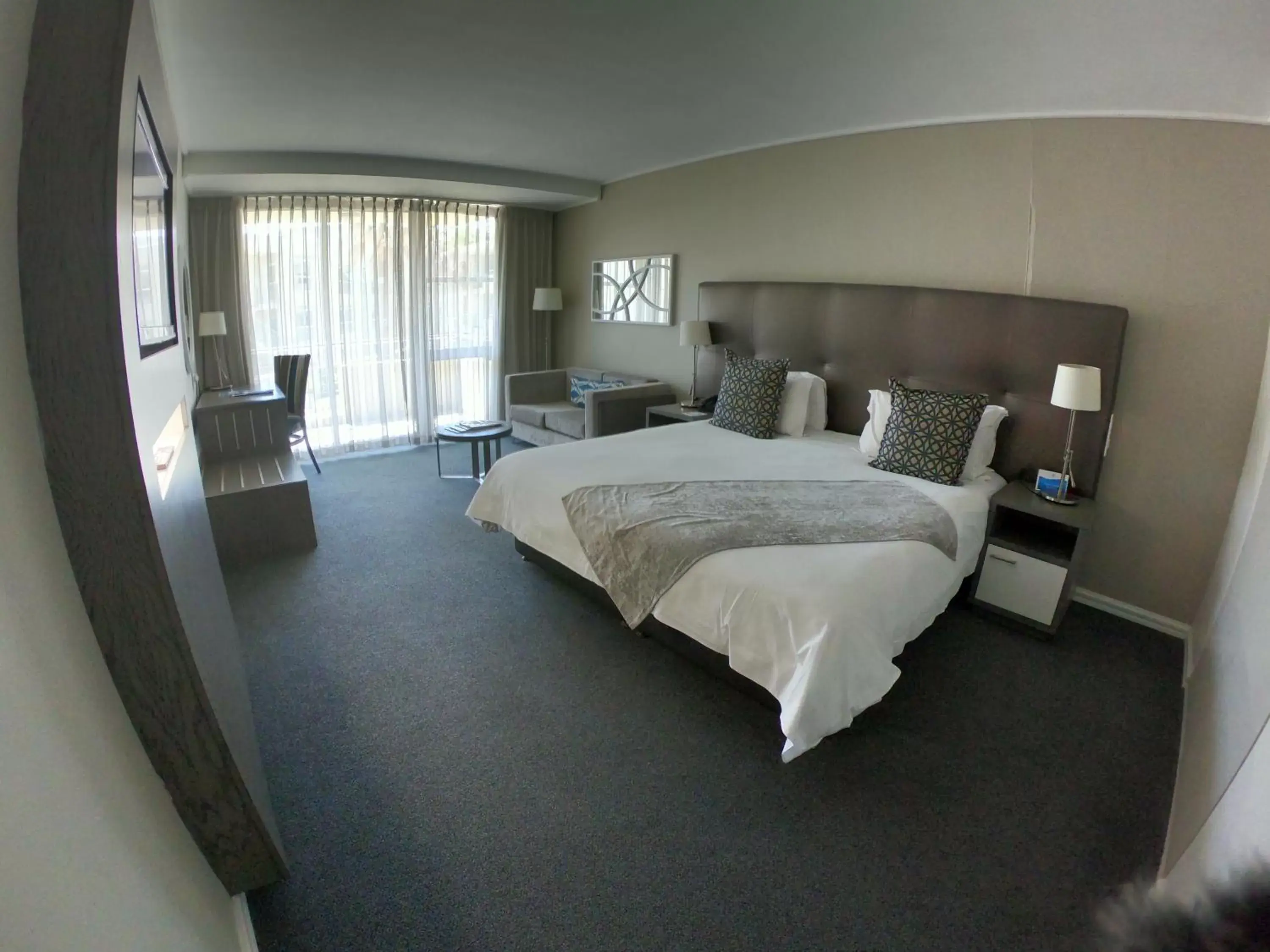 Photo of the whole room, Bed in Lagoon Beach Hotel & Spa