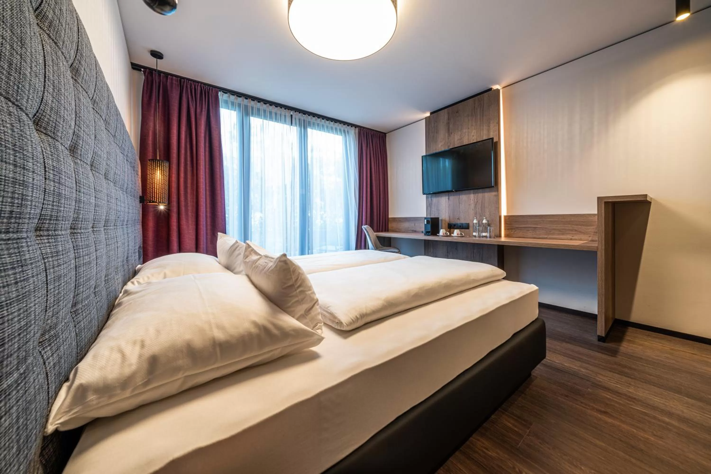 Bed in Rufi's Hotel Innsbruck