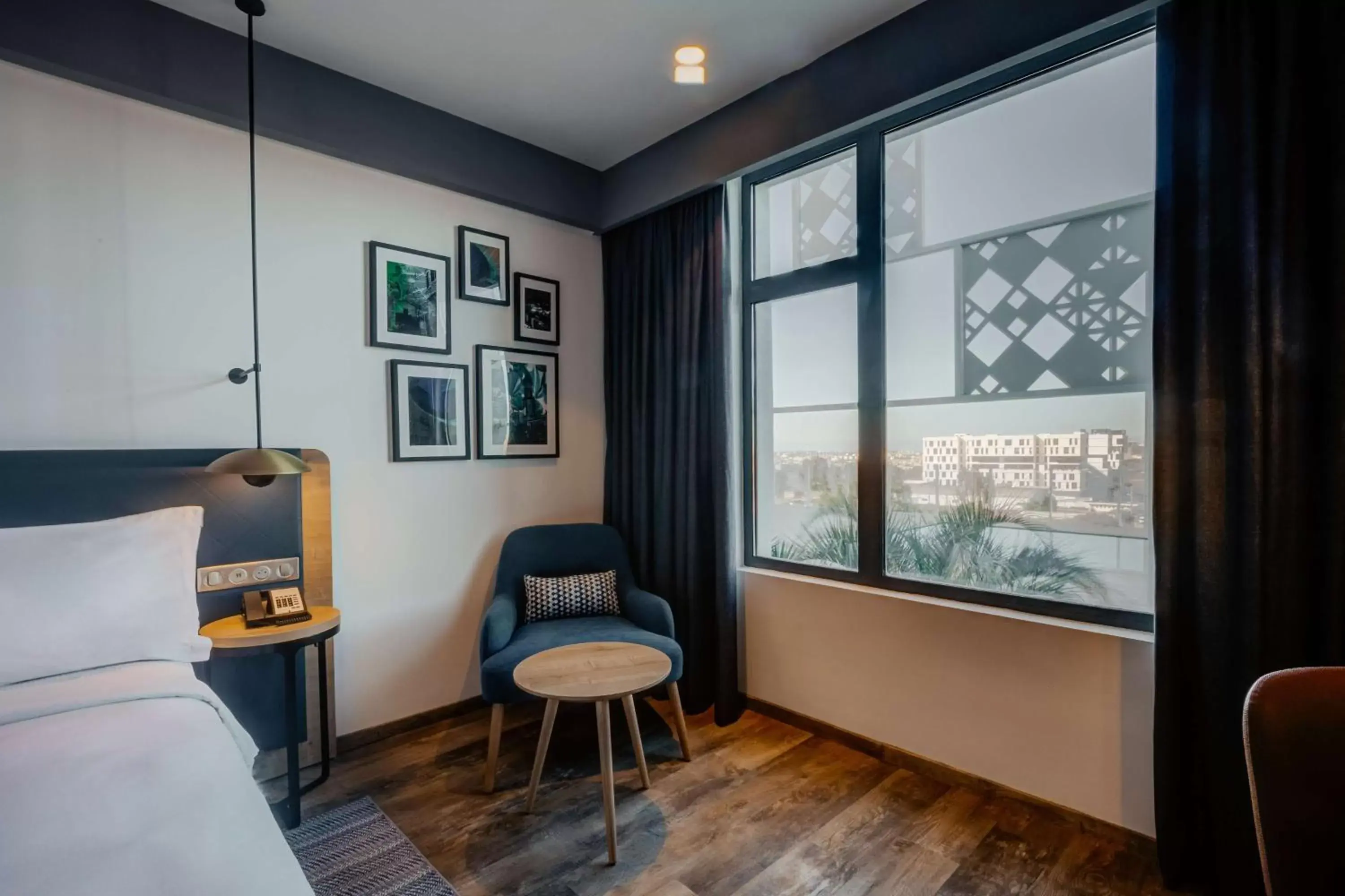 Bed, Seating Area in Hilton Garden Inn Casablanca Sud