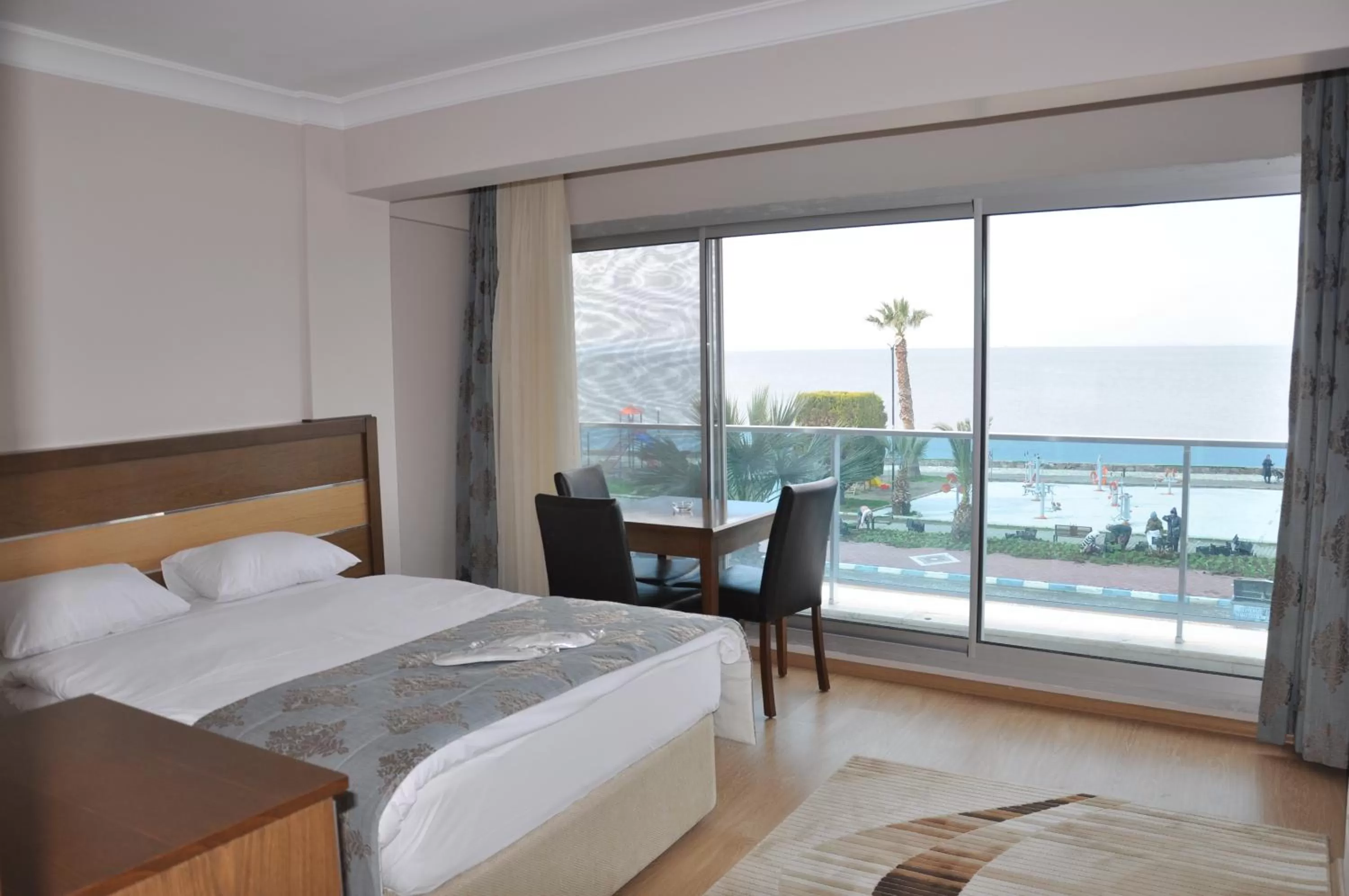 Bedroom in Perla Hotel