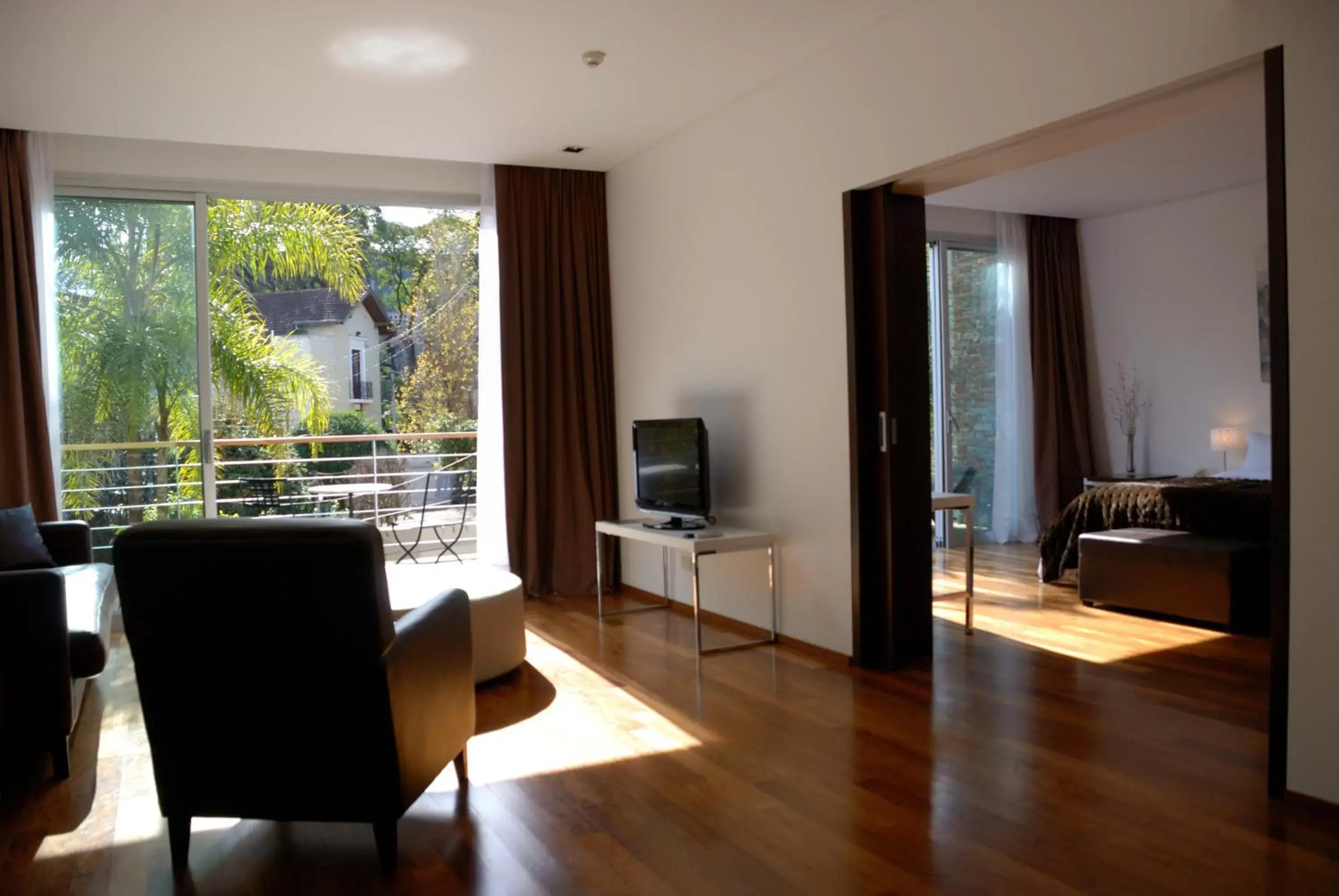 Photo of the whole room, TV/Entertainment Center in San Isidro Plaza Hotel