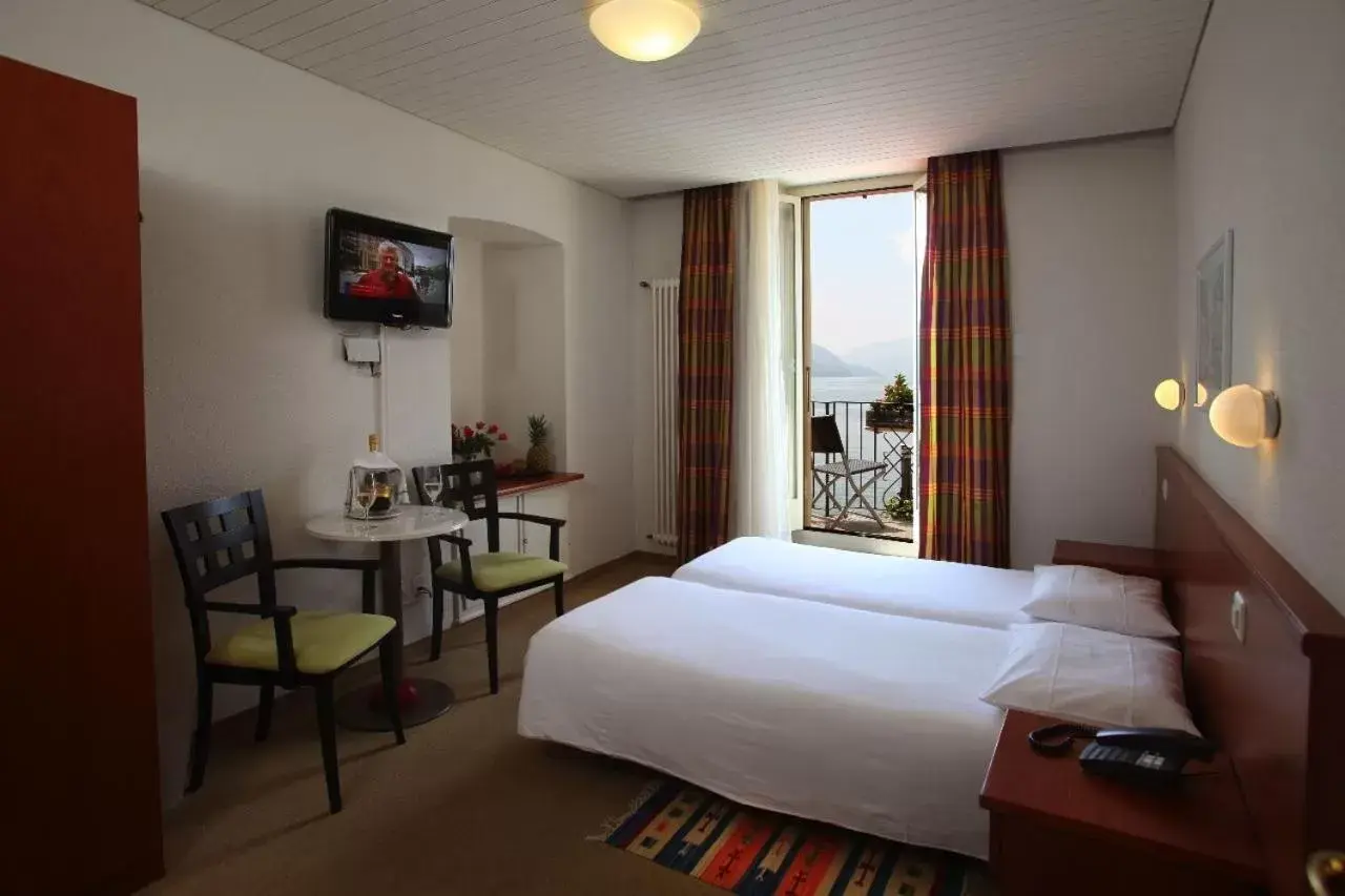 Twin Room with Balcony and Lake View in Piazza Ascona Hotel & Restaurants