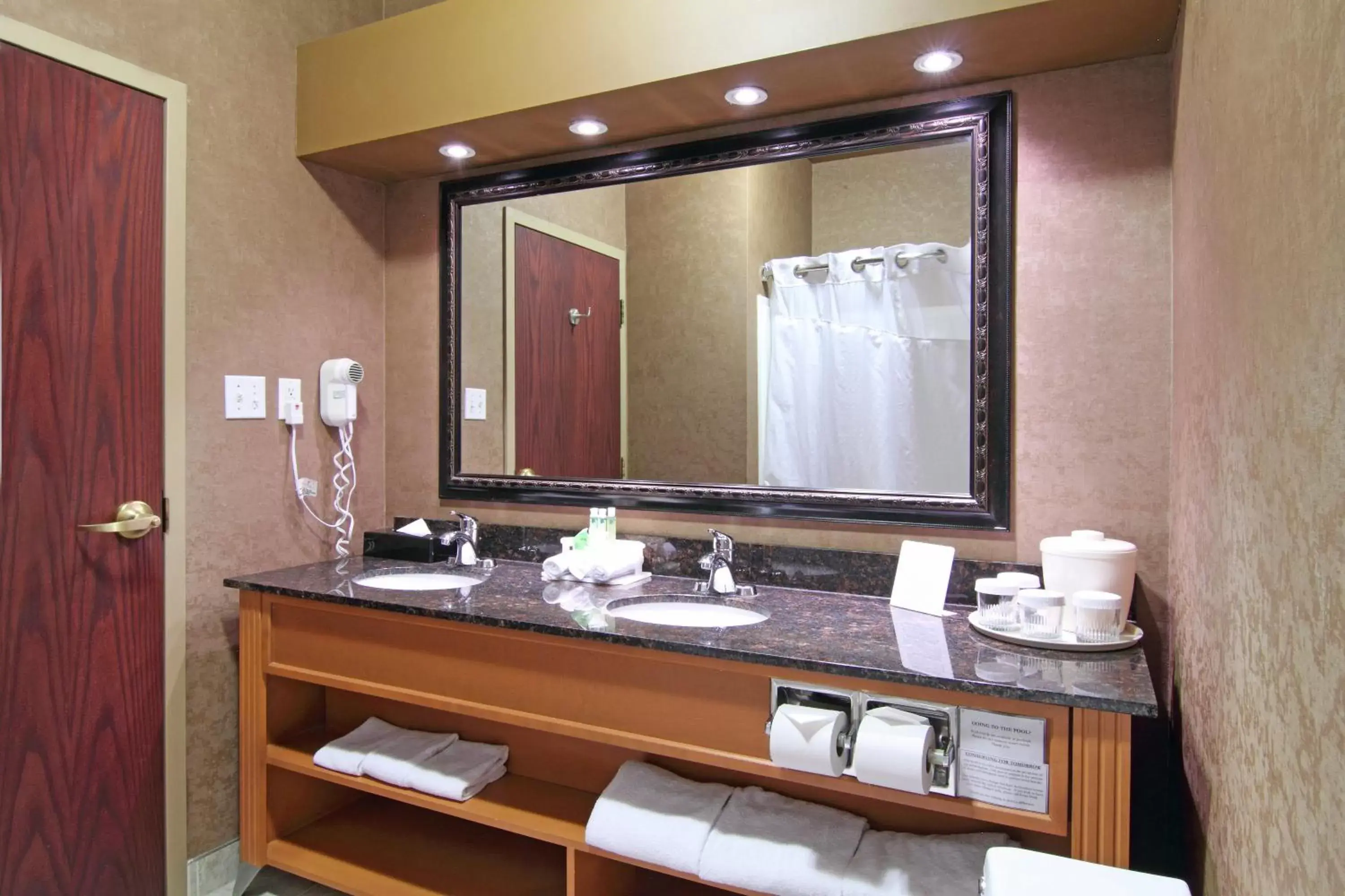 Bedroom, Bathroom in Holiday Inn Express Calgary South, an IHG Hotel