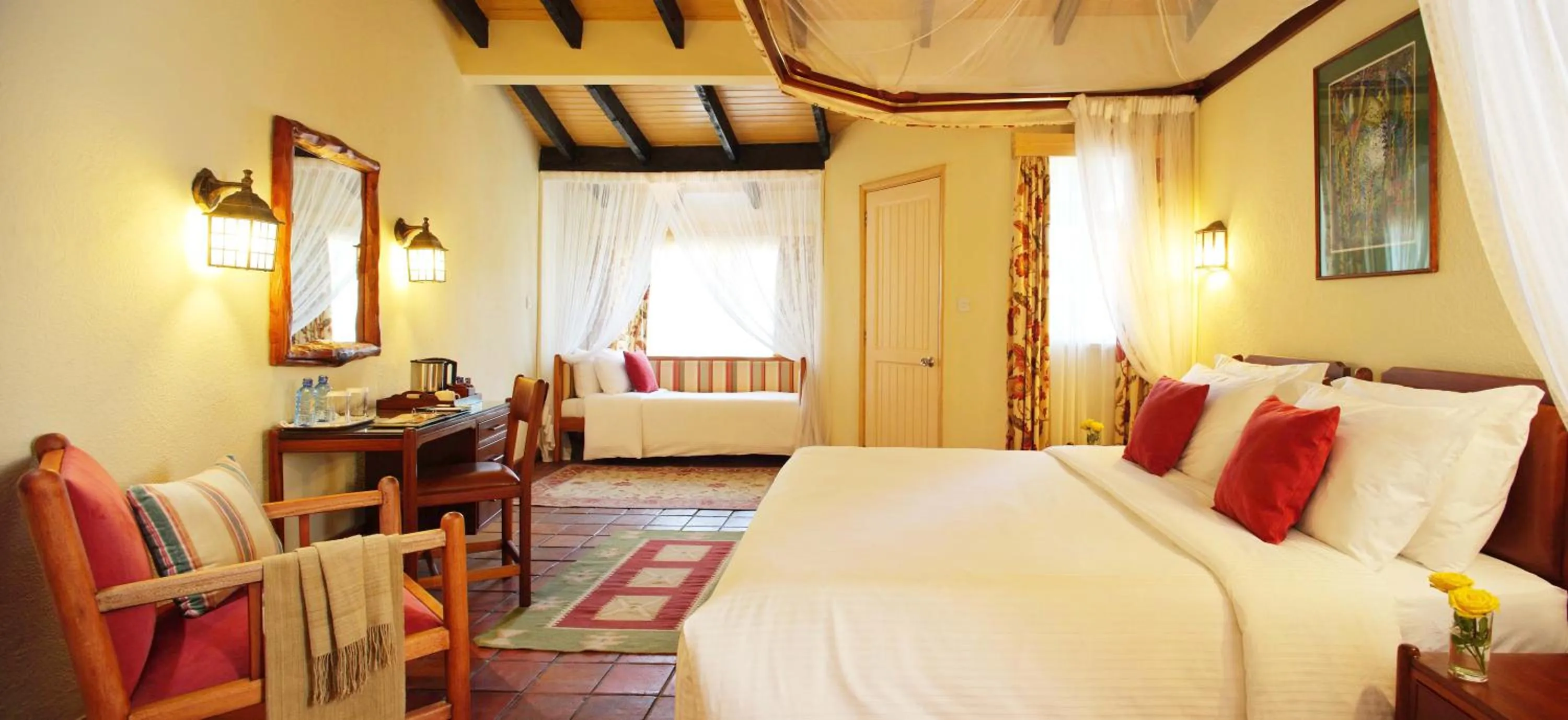 Bed in Sarova Lion Hill Game Lodge