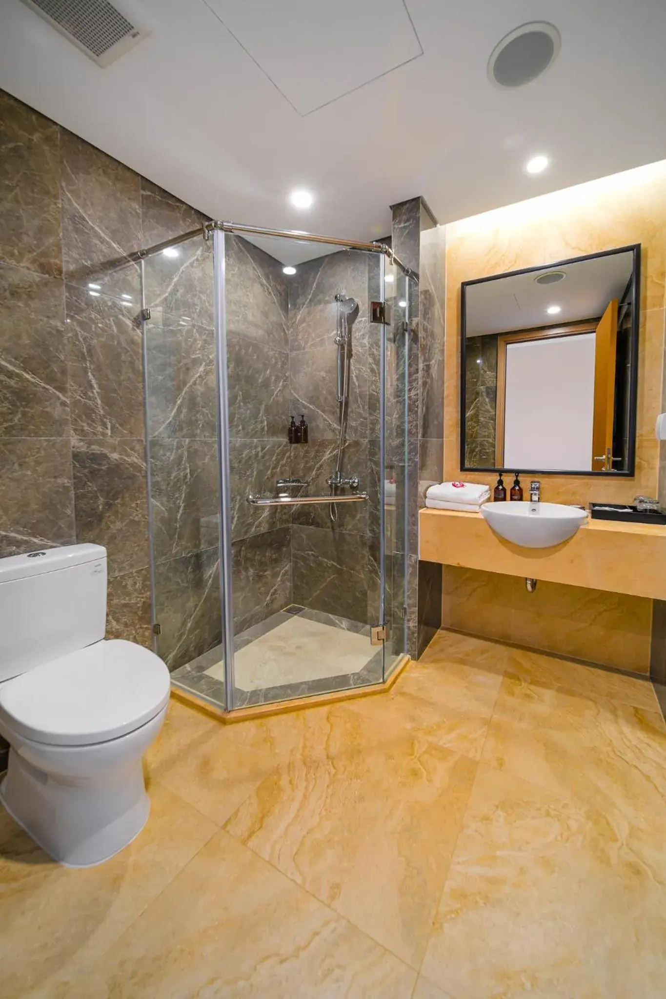 Shower, Bathroom in Wyndham Garden Grandworld Phu Quoc