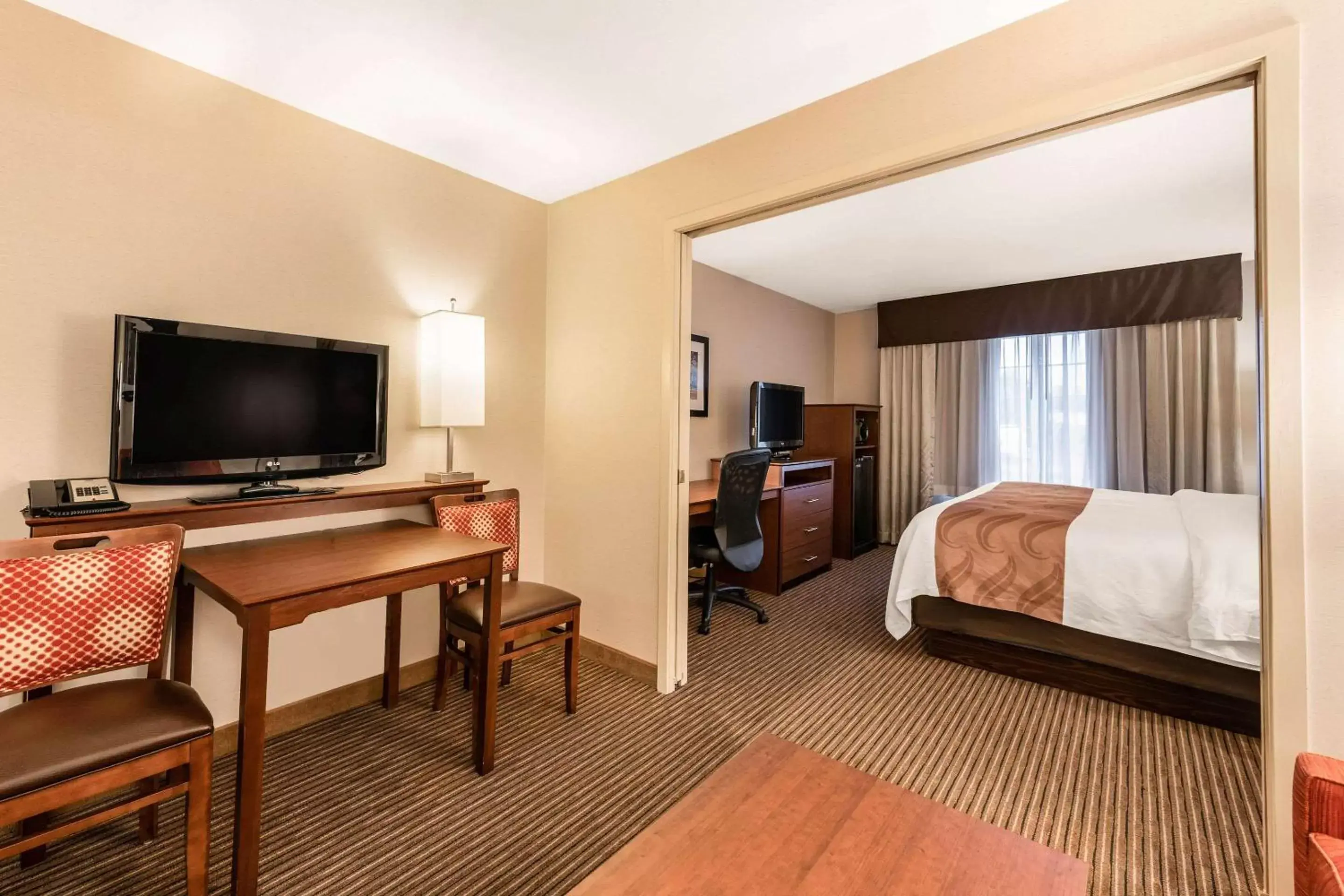 Photo of the whole room, TV/Entertainment Center in Quality Inn & Suites University Fort Collins